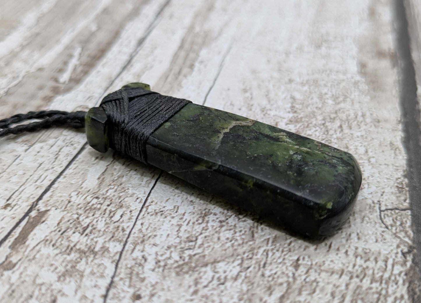 New Zealand Haast pass serpentine Toki pendant.