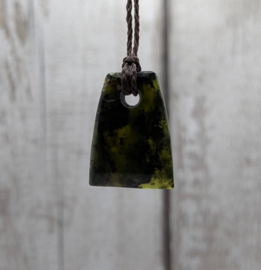 Haast pass serpentine pounamu greenstone Toki style pendant.