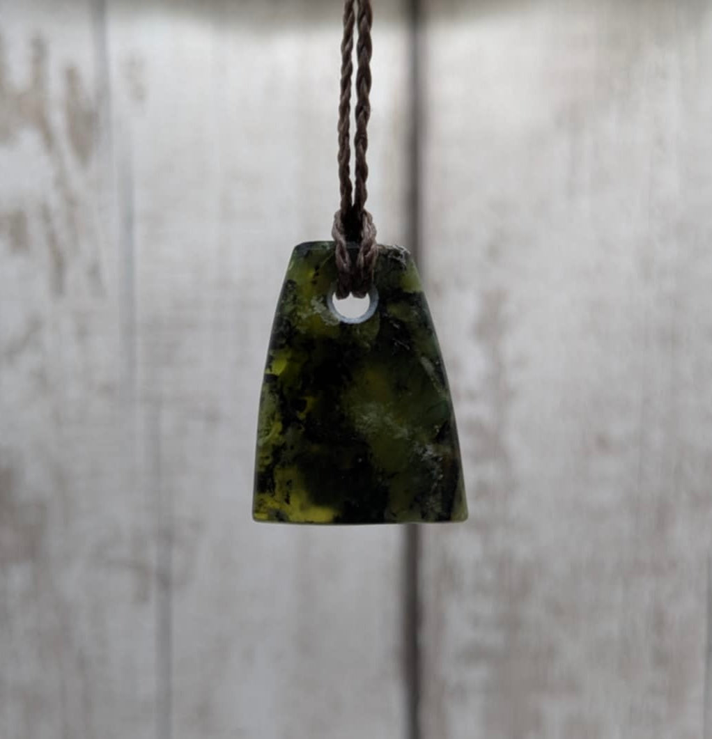 Haast pass serpentine pounamu greenstone Toki style pendant.