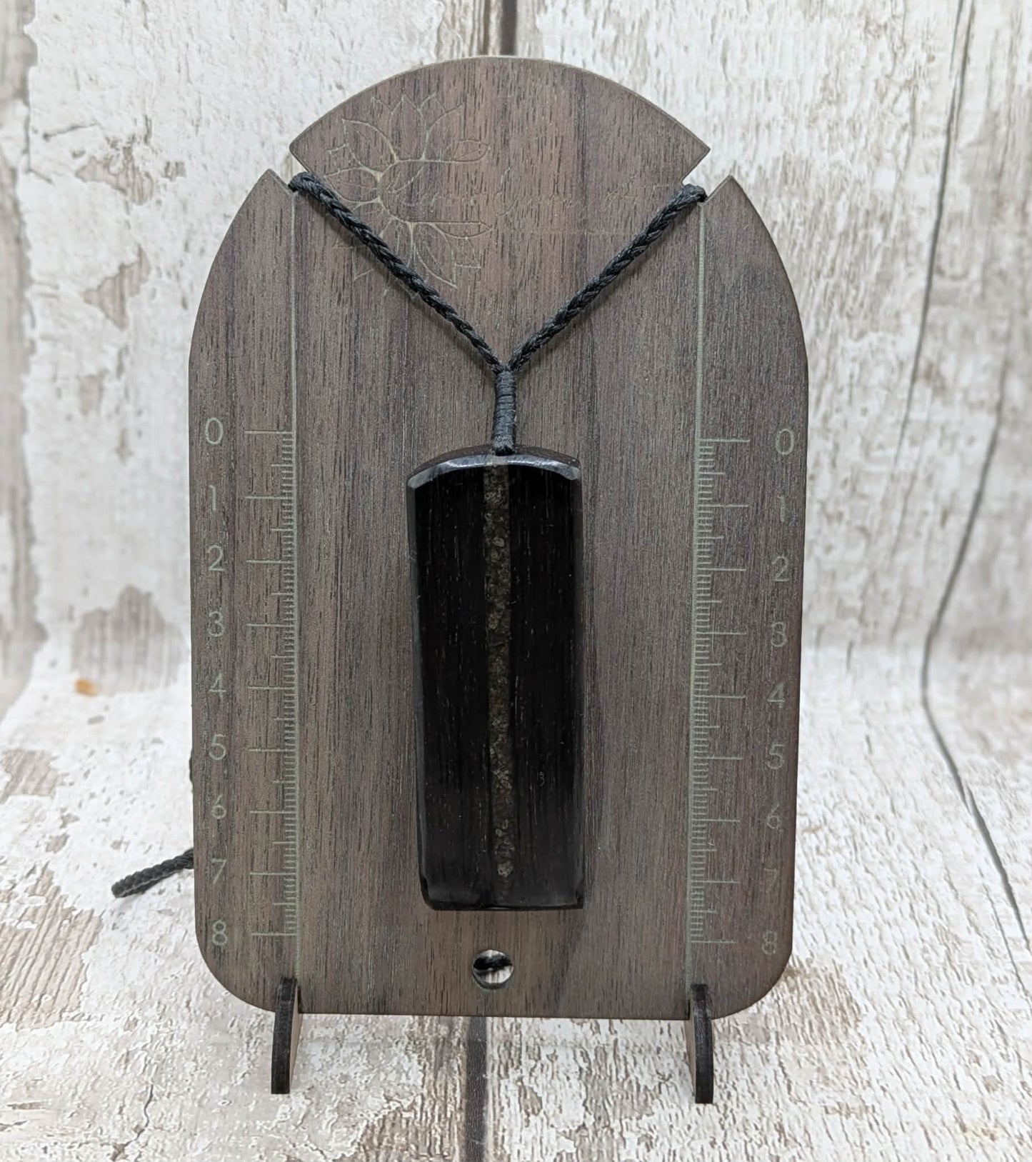Fenland bog oak with mammoth tooth inlay, Toki adze style pendant.