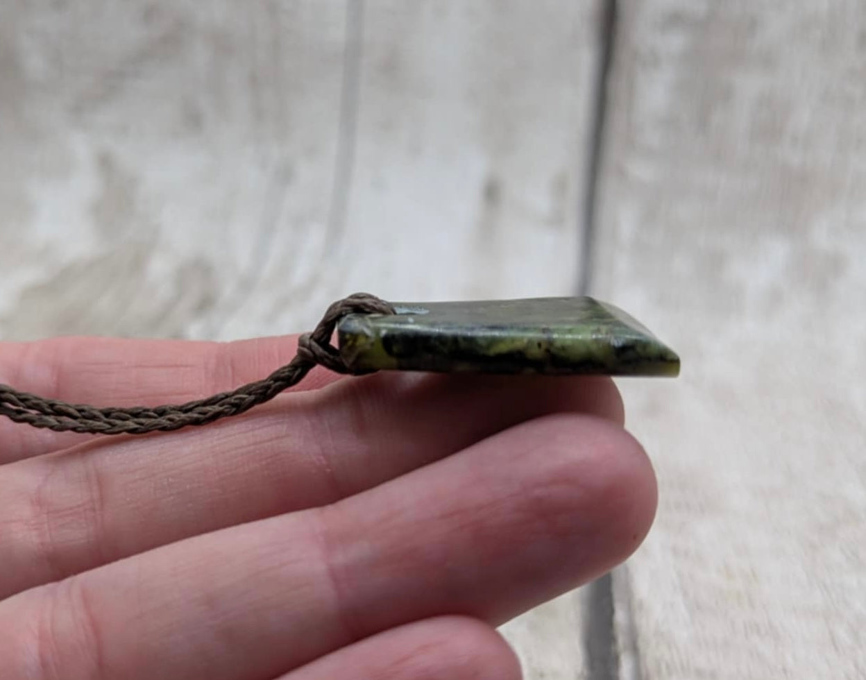 Haast pass serpentine pounamu greenstone Toki style pendant.