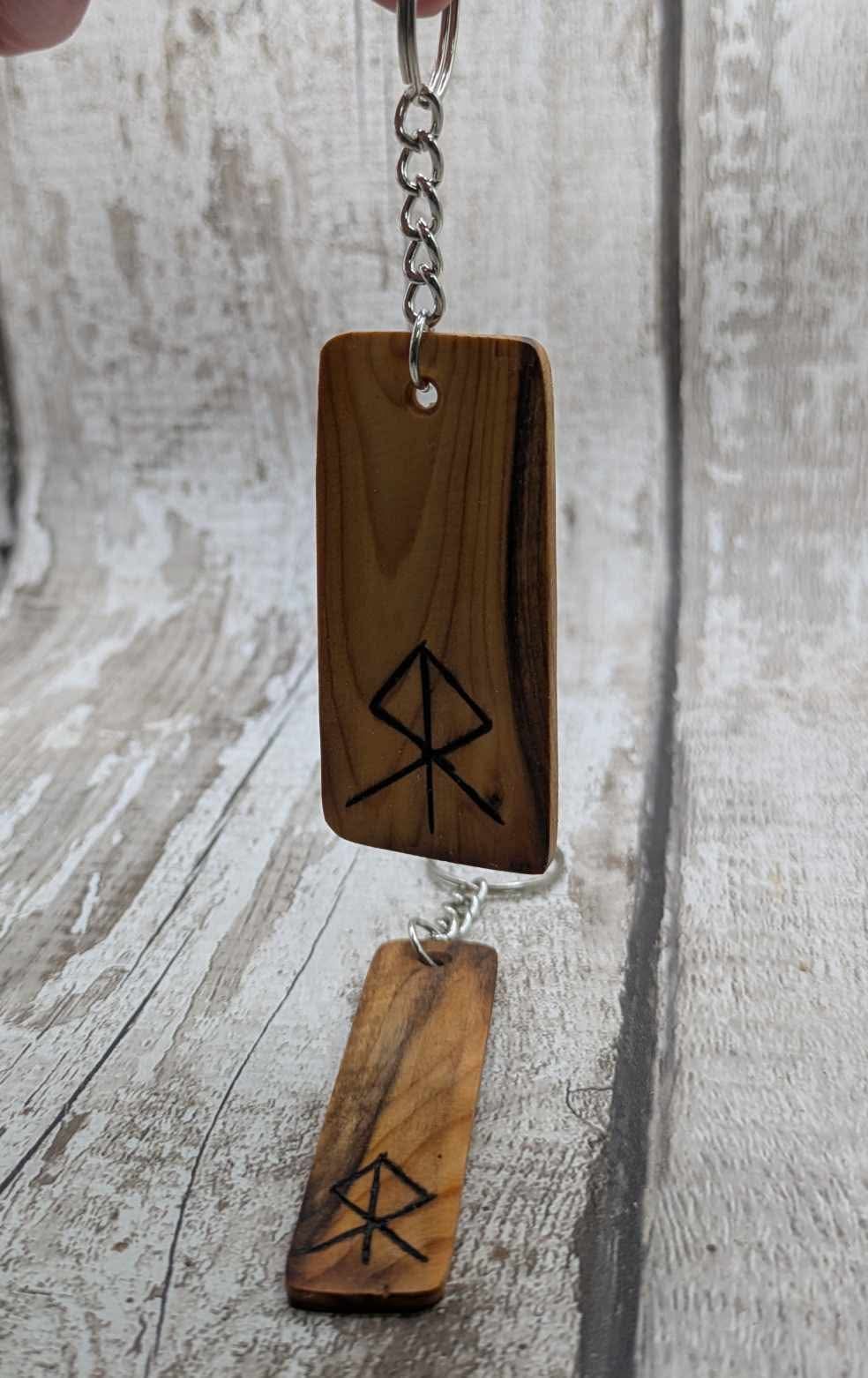 Yew wood protection bind rune keyring.