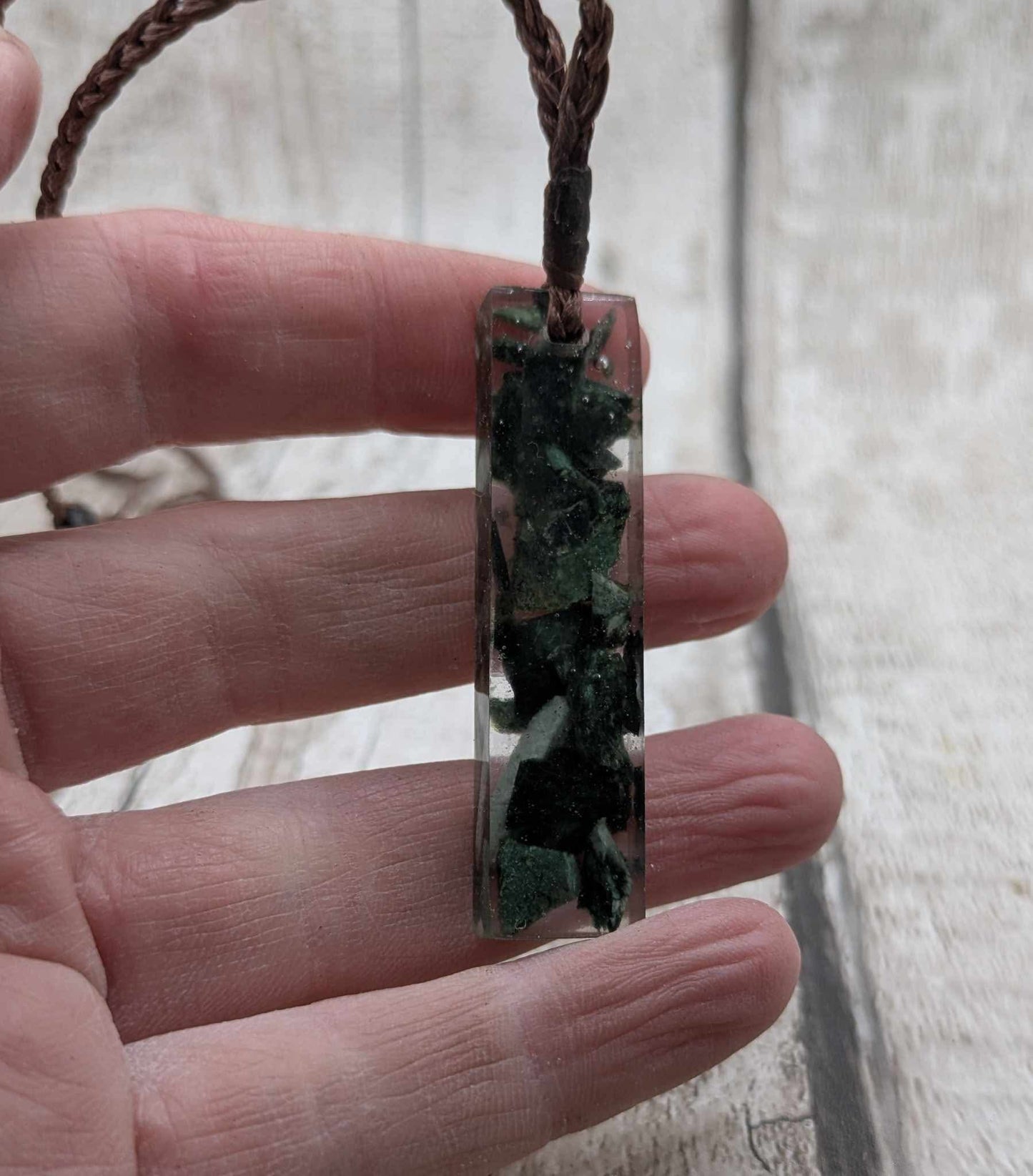 New Zealand mixed Pounamu chip pendant in UV resin.