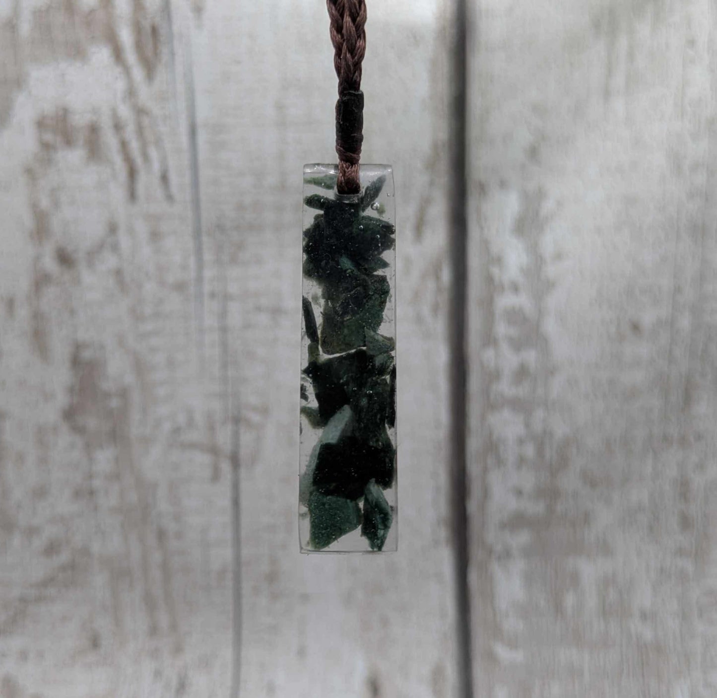 New Zealand mixed Pounamu chip pendant in UV resin.