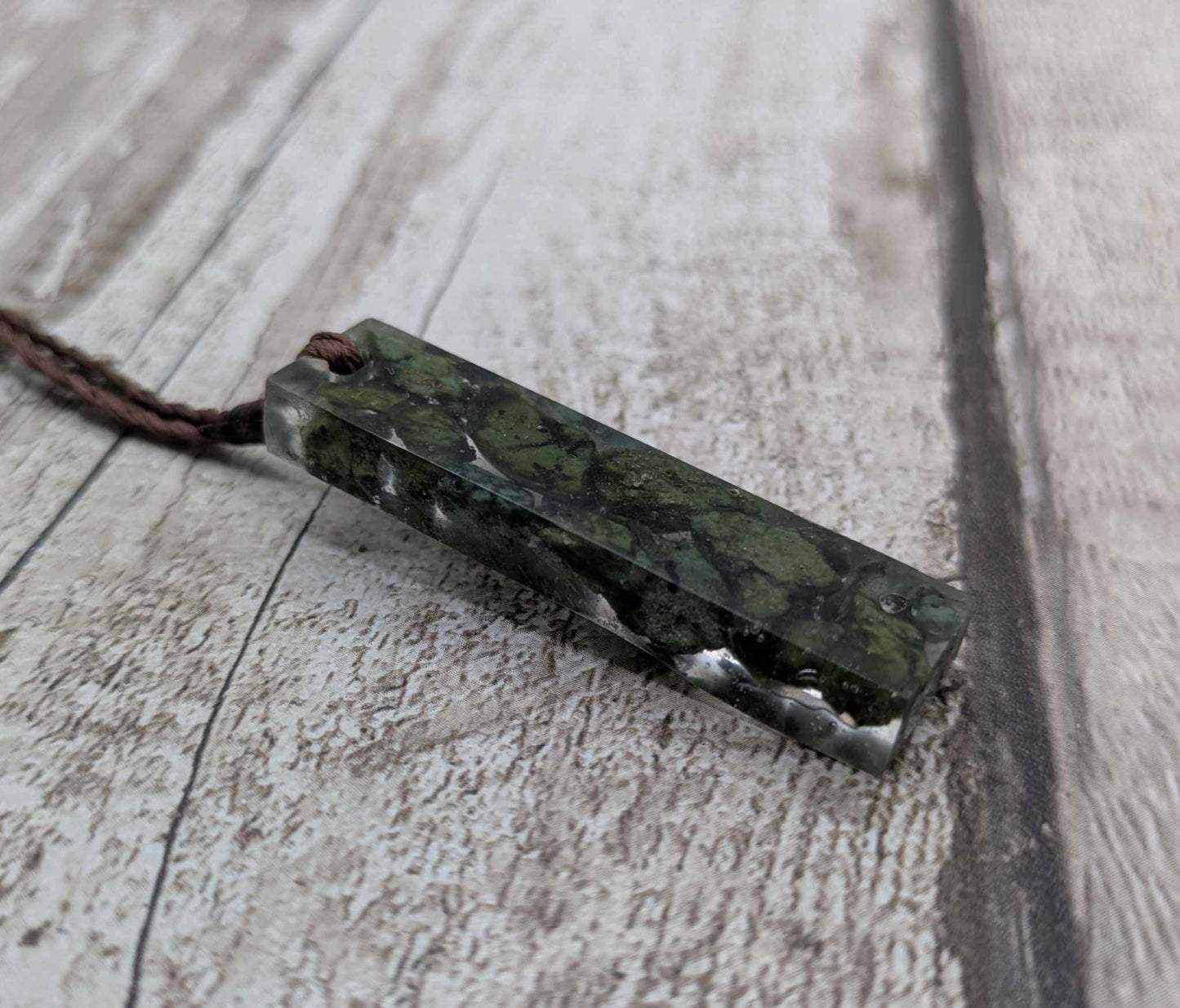 New Zealand mixed Pounamu greenstone chip pendant in UV resin.
