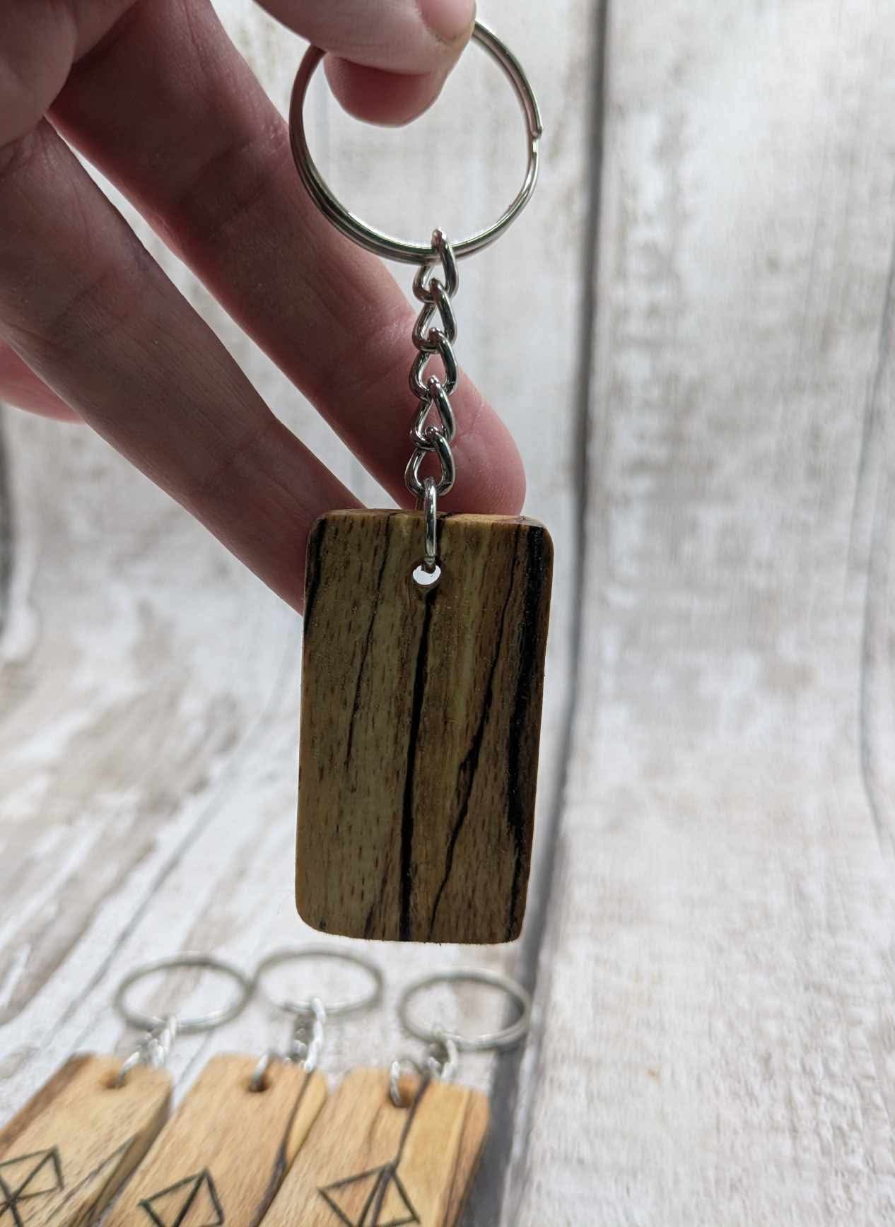 Spalted beech wood protection bind rune keyring.