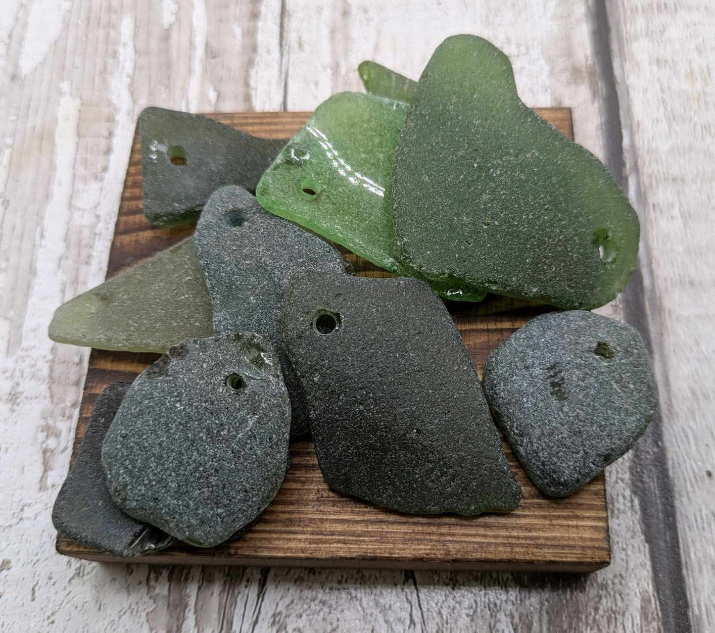 Green sea glass top drilled beads.