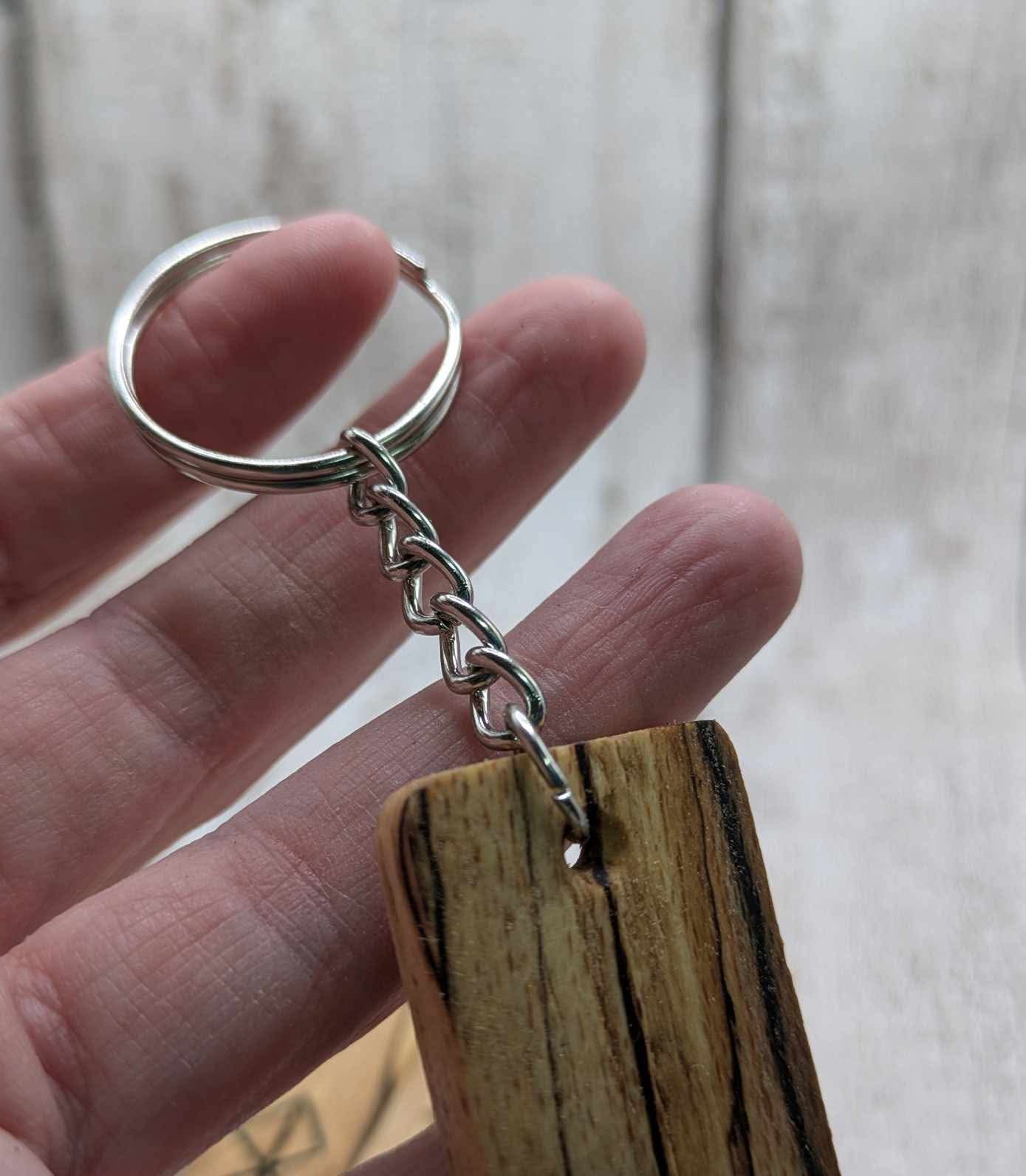 Spalted beech wood protection bind rune keyring.