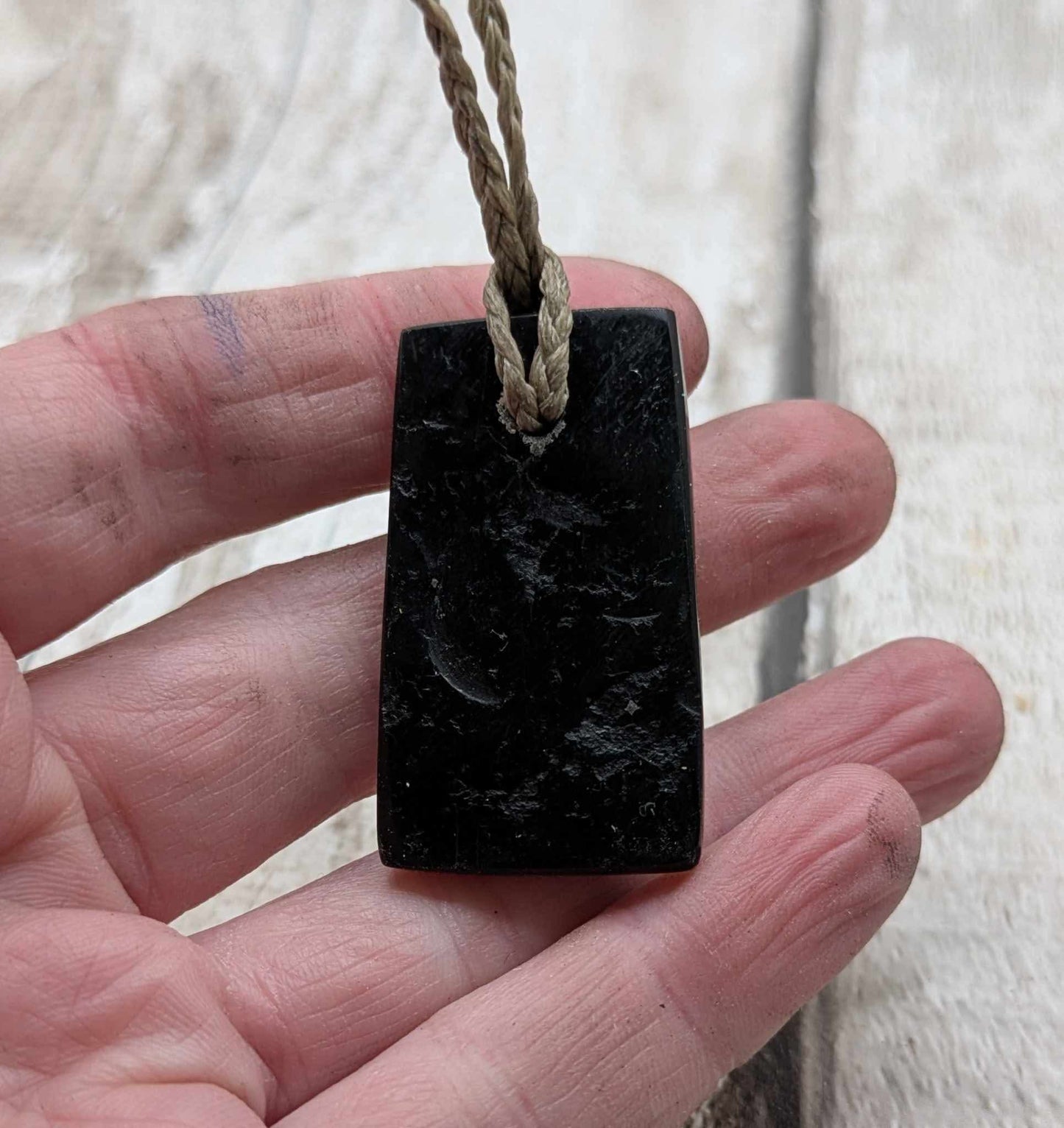 Sea coal rectangular pendant.