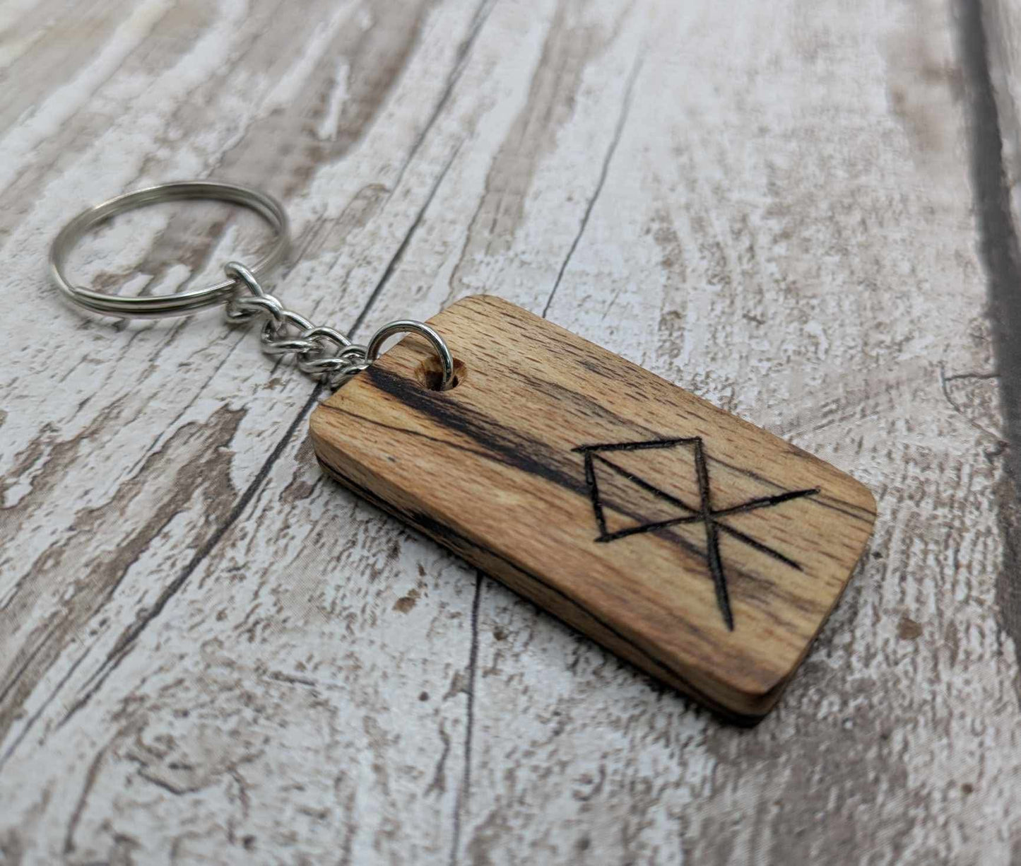Spalted beech wood protection bind rune keyring.