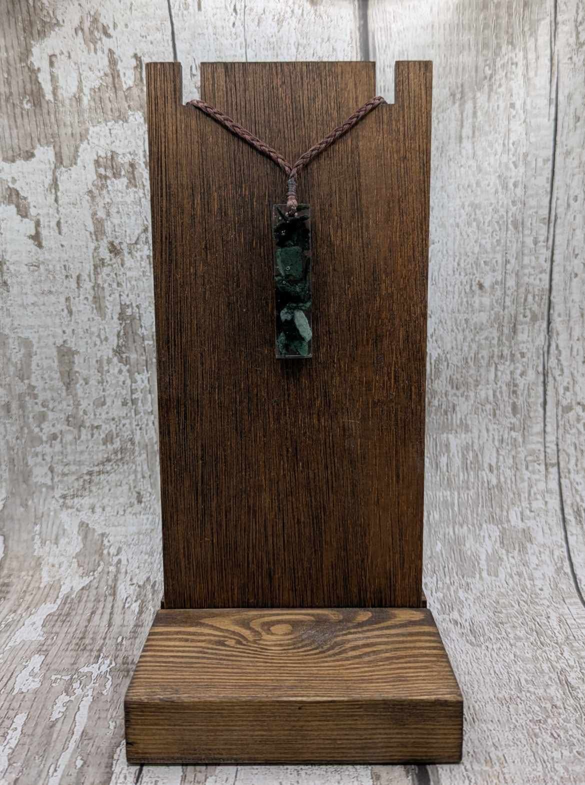 New Zealand mixed Pounamu chip pendant in UV resin.