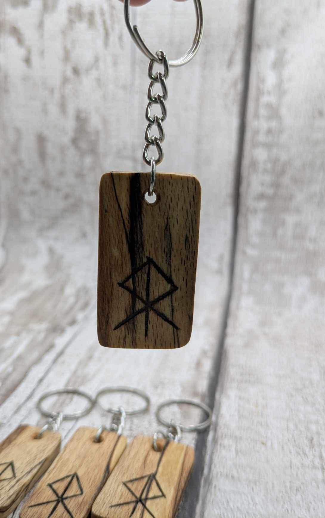 Spalted beech wood protection bind rune keyring.