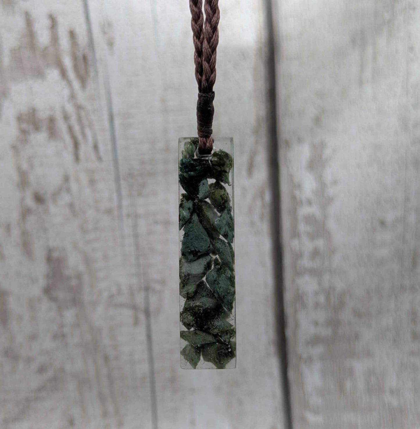 New Zealand mixed Pounamu greenstone chip pendant in UV resin.