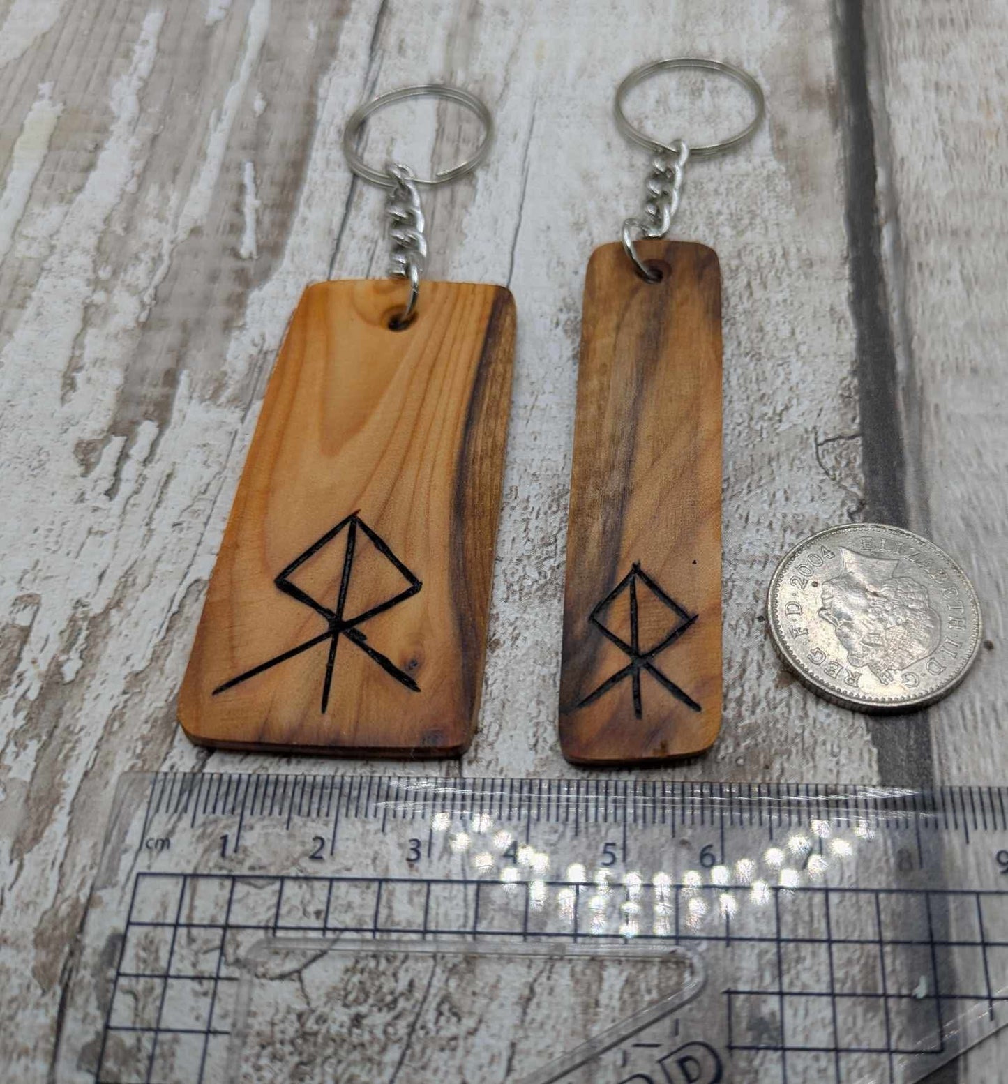 Yew wood protection bind rune keyring.