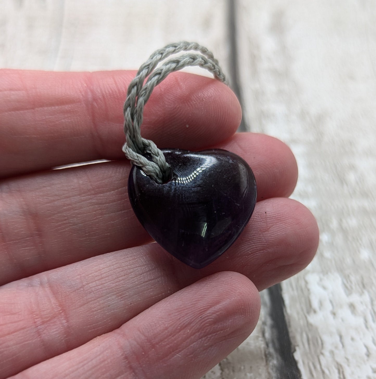 small amethyst stone heart pendant.