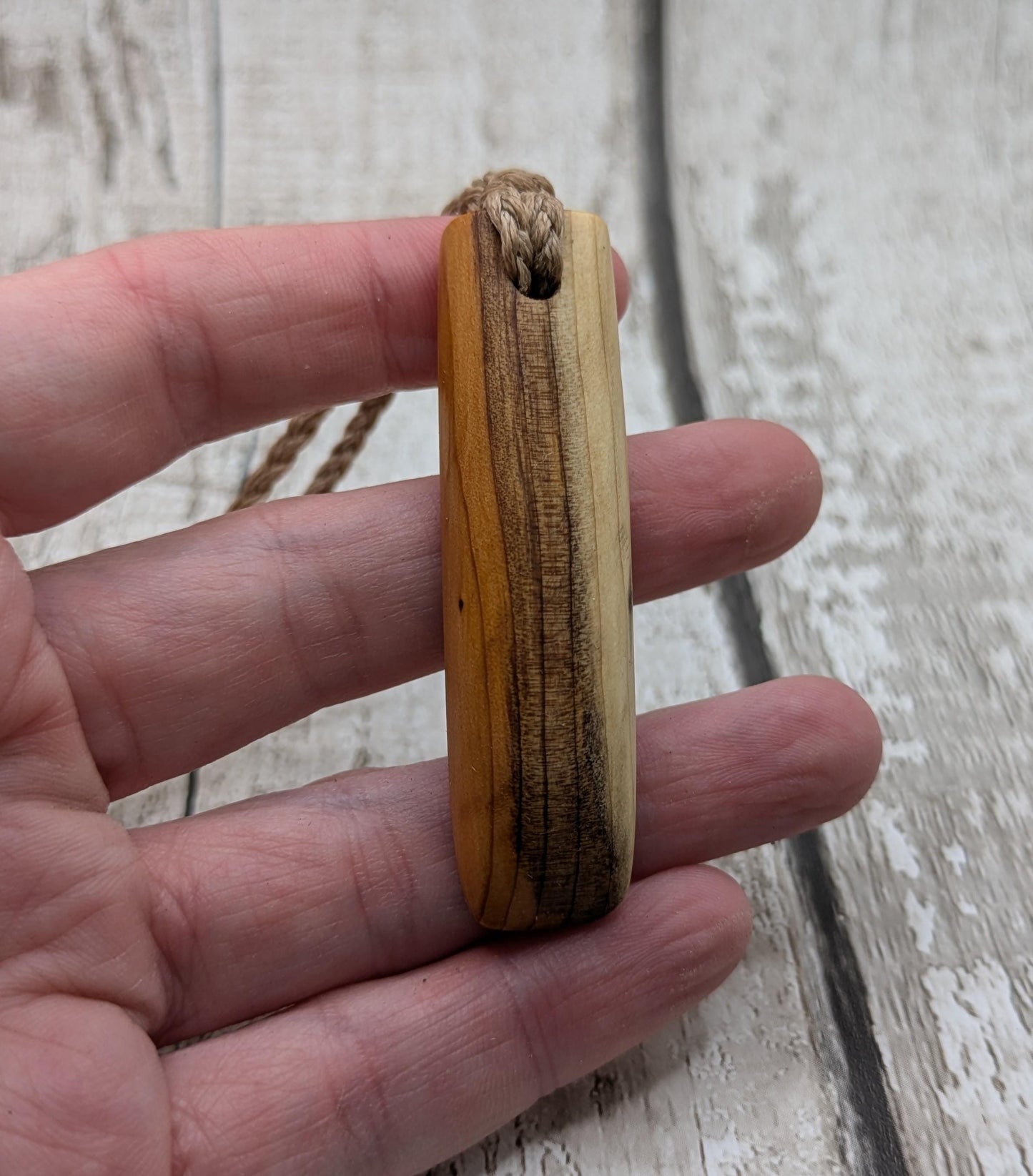 yew wood carved toki styled pendant - Handcrafted jewellery.