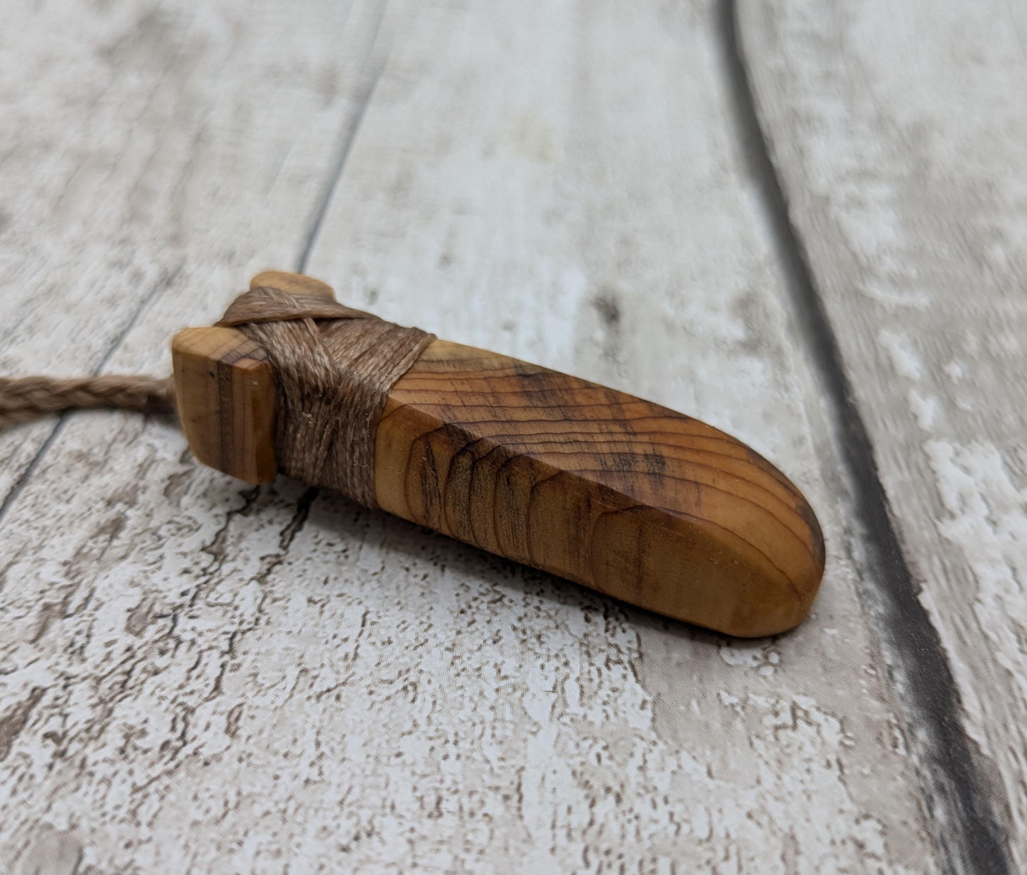 yew wood hey took adze pendant.