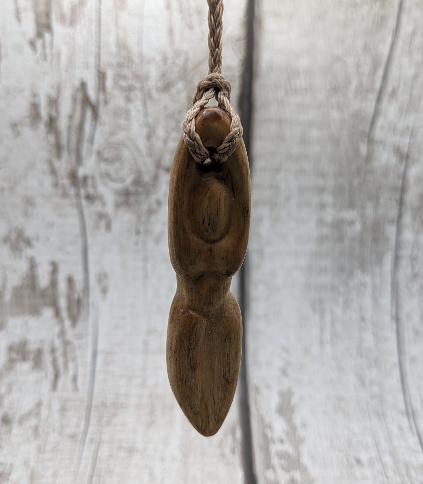 Maple wood carved goddess pendant