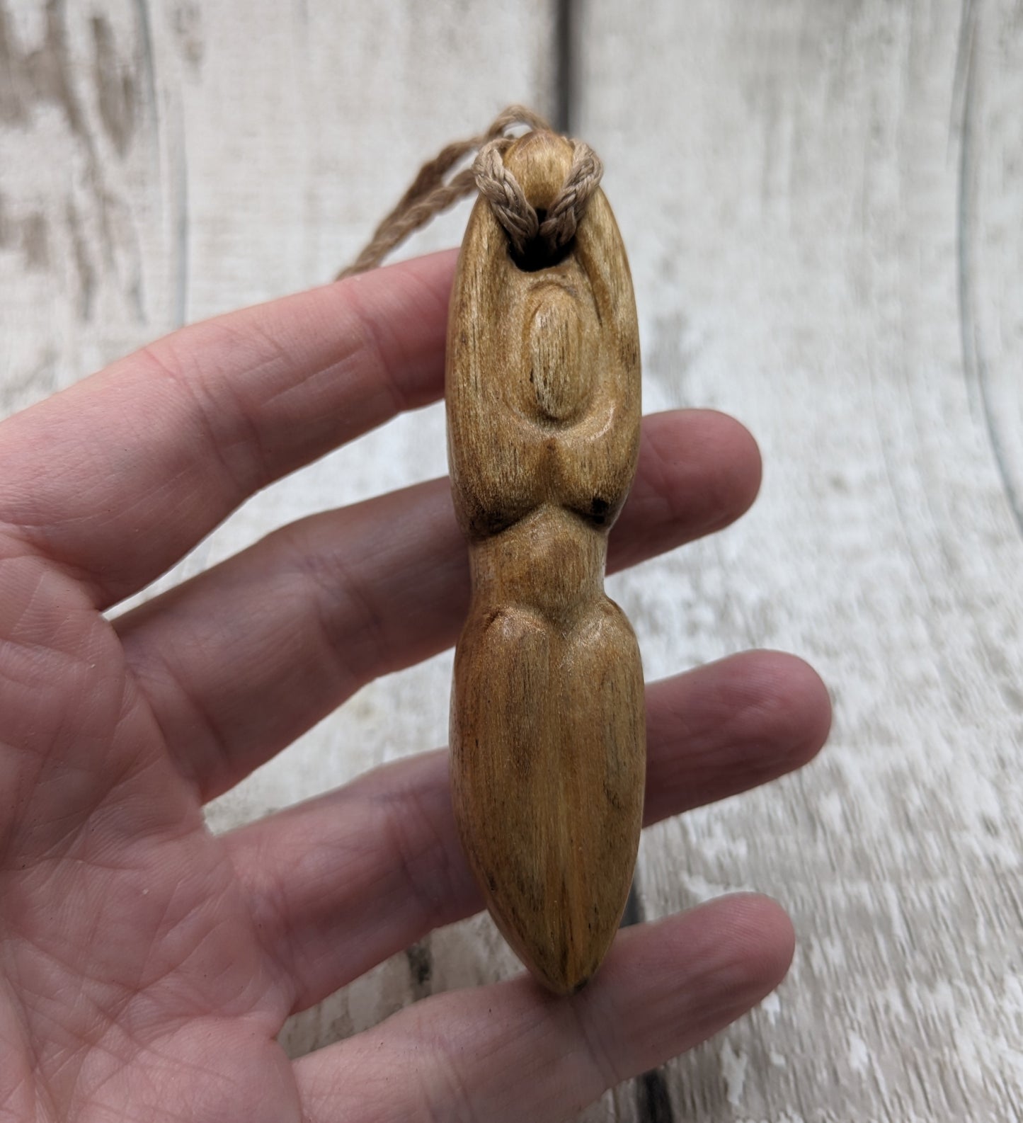 Maple wood carved goddess pendant