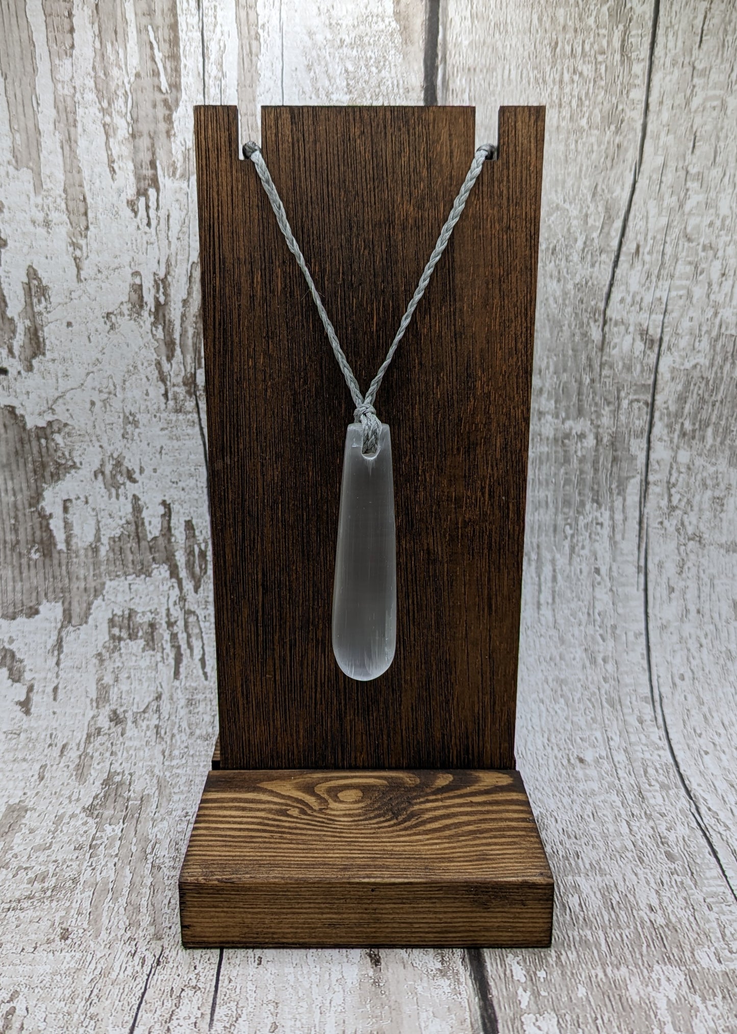 Selenite satin spar roimata teardrop pendant.