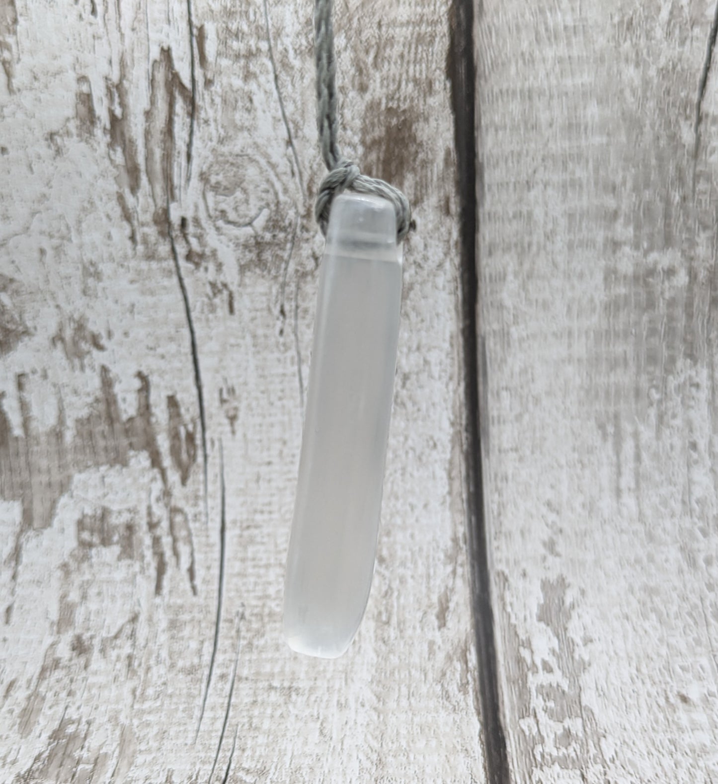 Selenite satin spar roimata teardrop pendant.