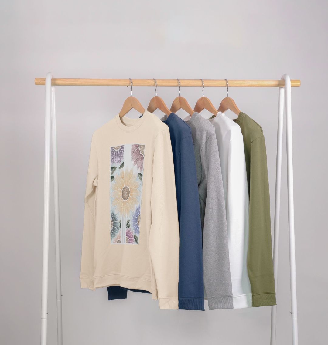 Unisex sunflower banner motif sweatshirt.