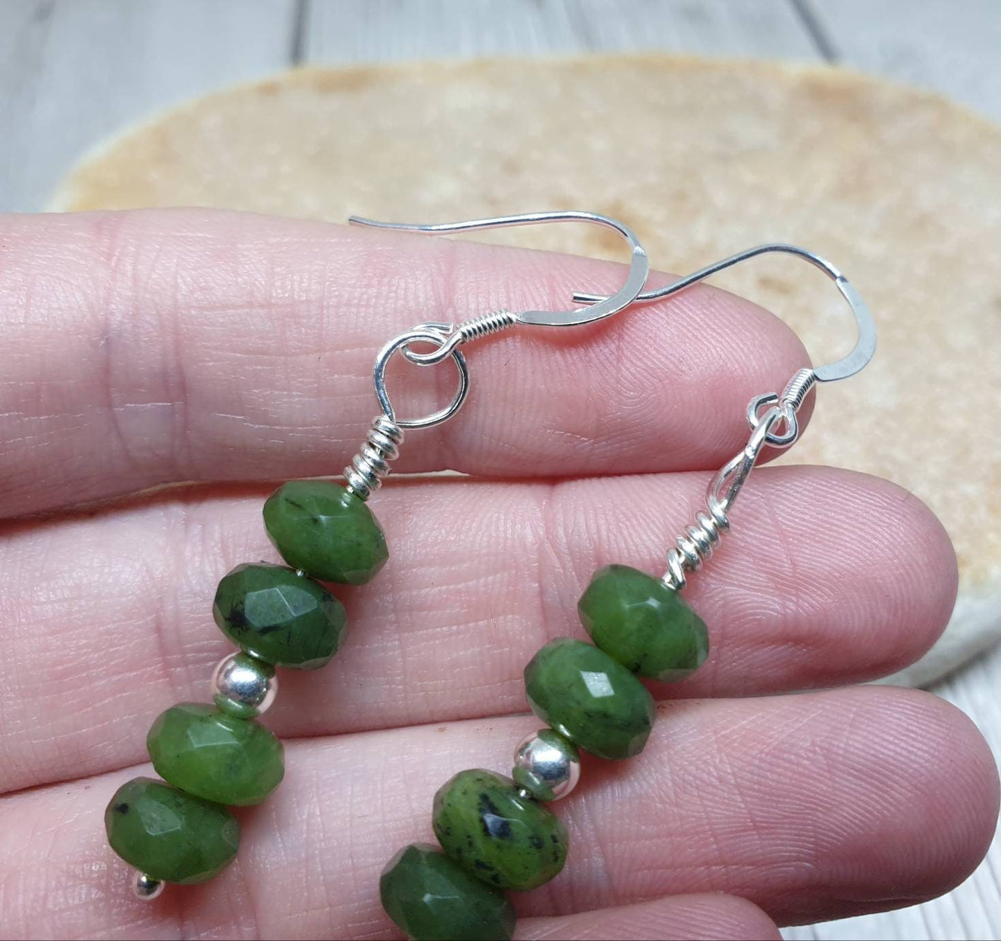 Nephrite jade faceted rondelle beaded earrings on 925 sterling silver.