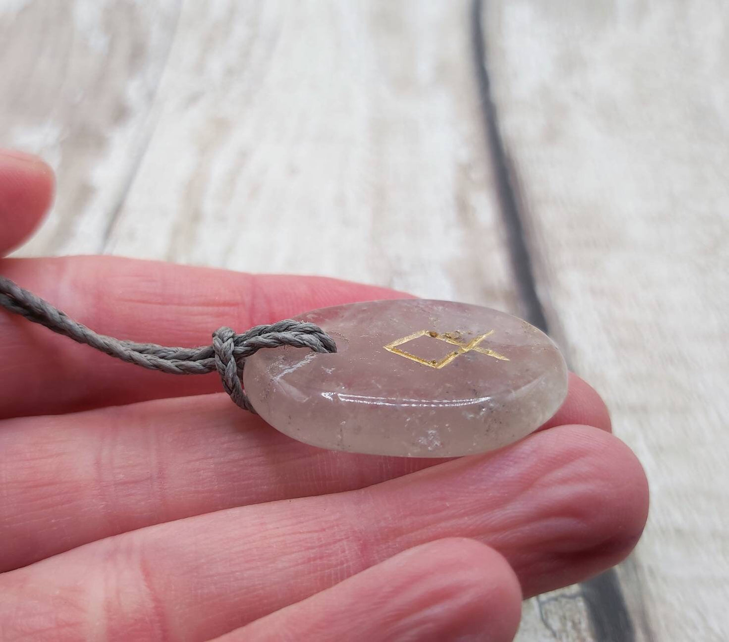 Othlala Nordic rune stone clear quartz crystal unisex pendant.