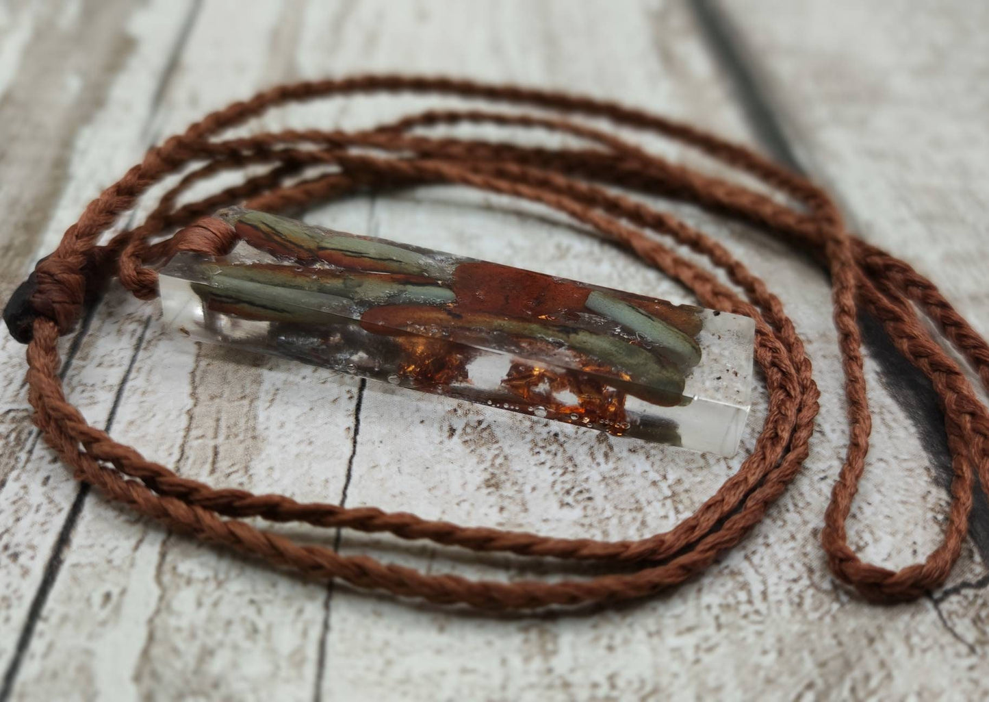 Australian nephrite Jade in epoxy resin with copper and Italian silver leaf.