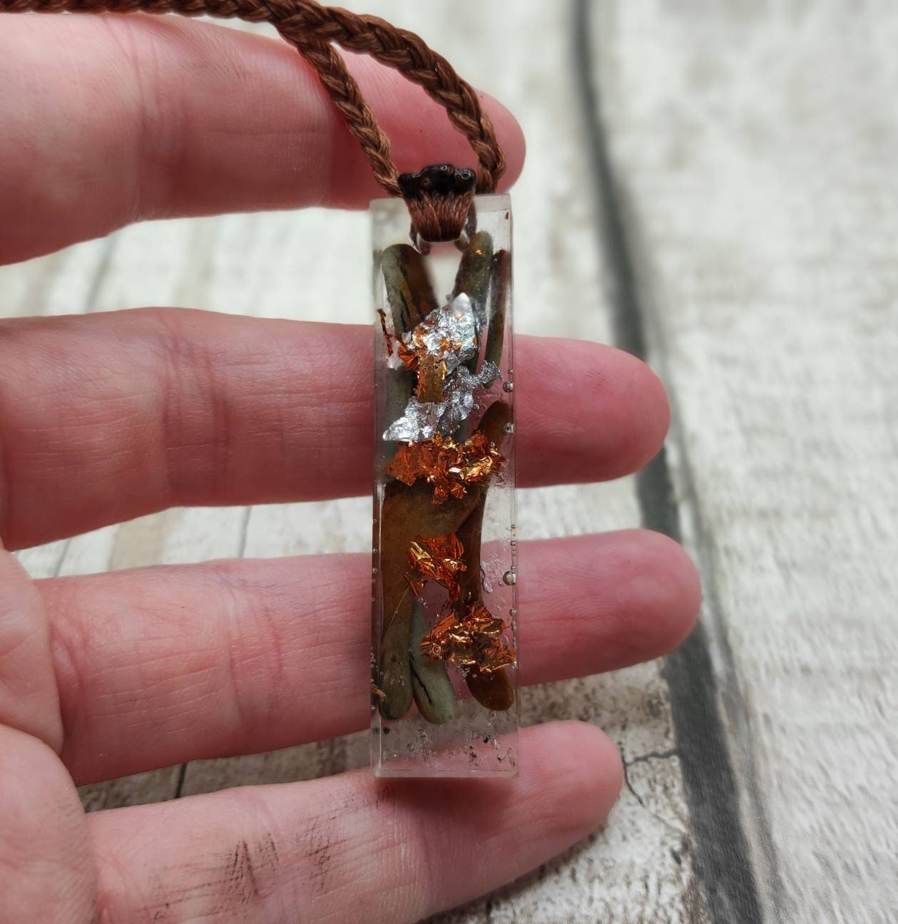 Australian nephrite Jade in epoxy resin with copper and Italian silver leaf.