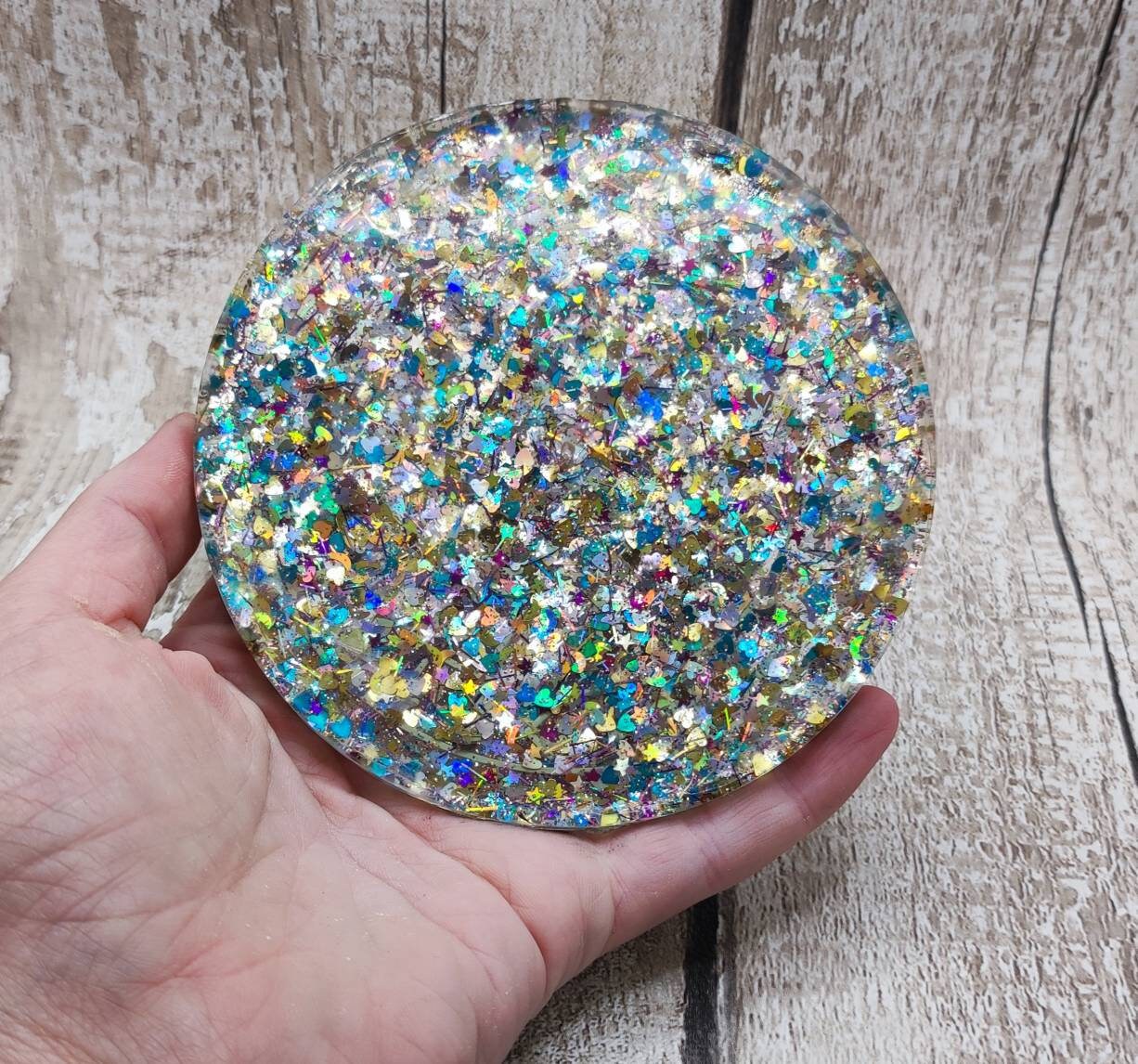Glitter filled runic divination compass board incense holder.