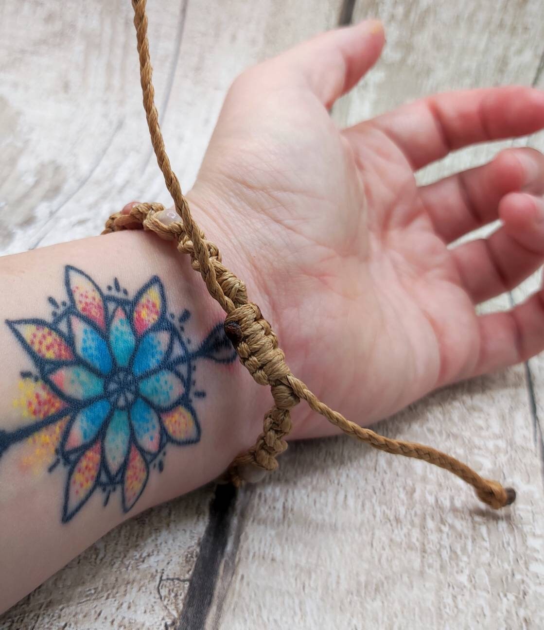 Lepidolite macramé beaded and woven adjustable unisex bracelet.