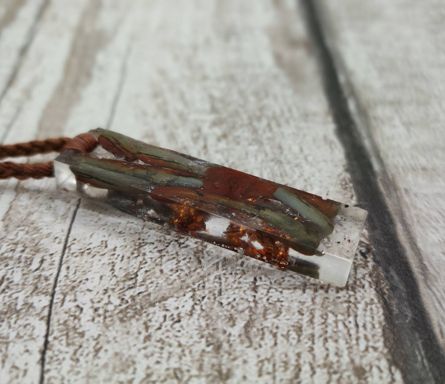 Australian nephrite Jade in epoxy resin with copper and Italian silver leaf.