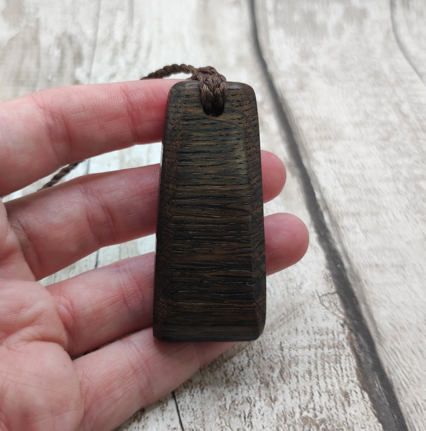 Bog oak heintoki adze styled unisex pendant.