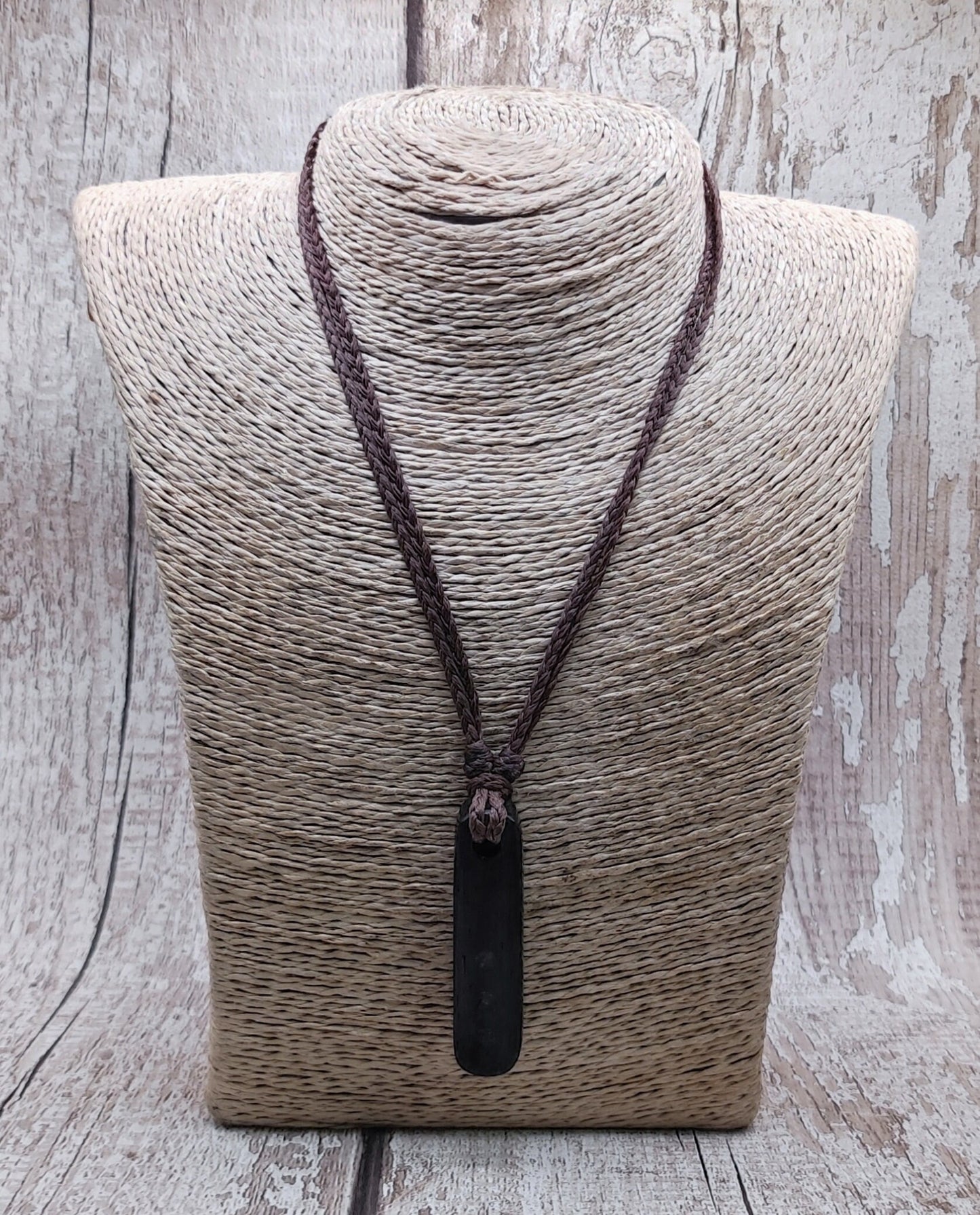 Bog oak wood and moldavite roimata pendant.