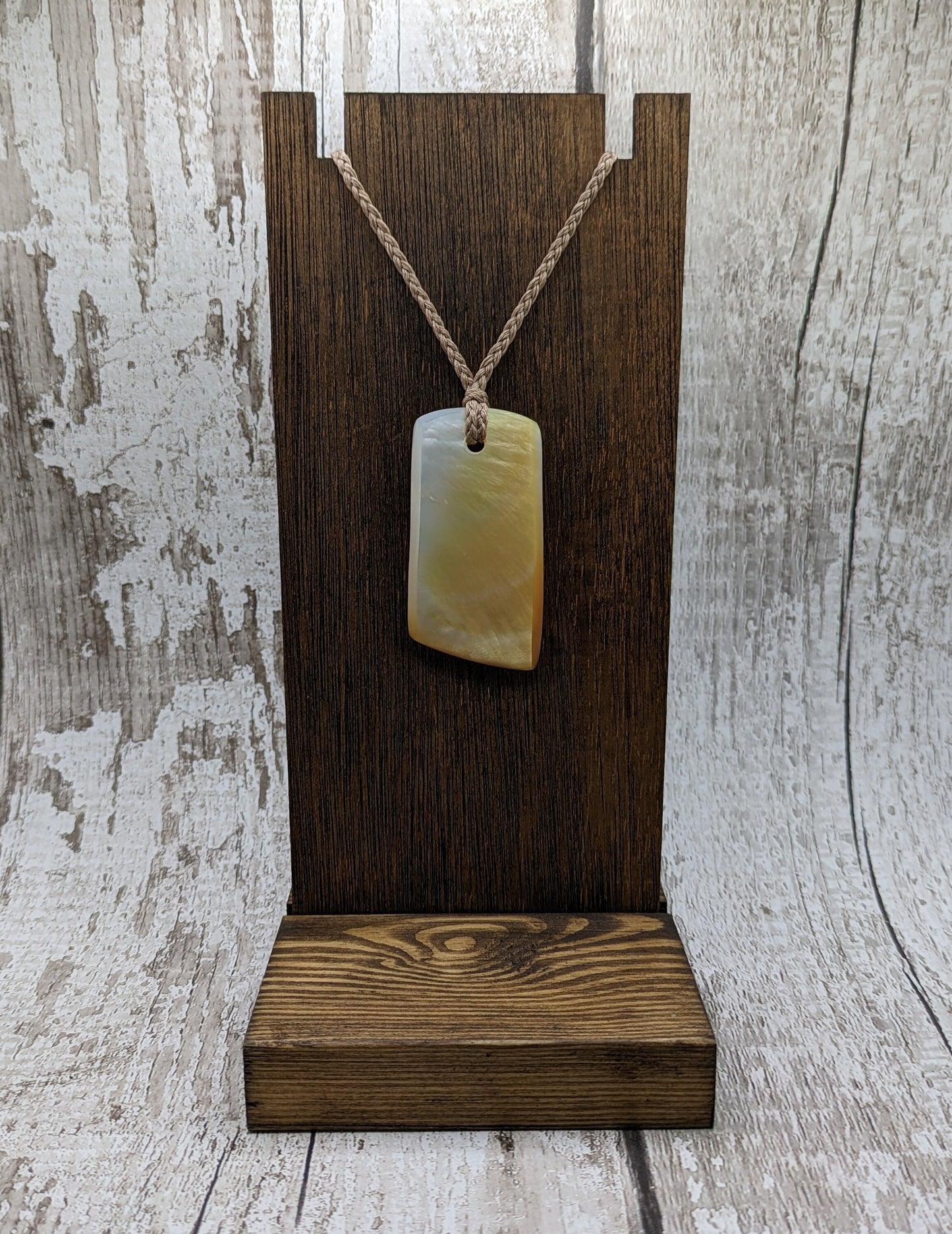Mother of pearl shell toki styled pendant