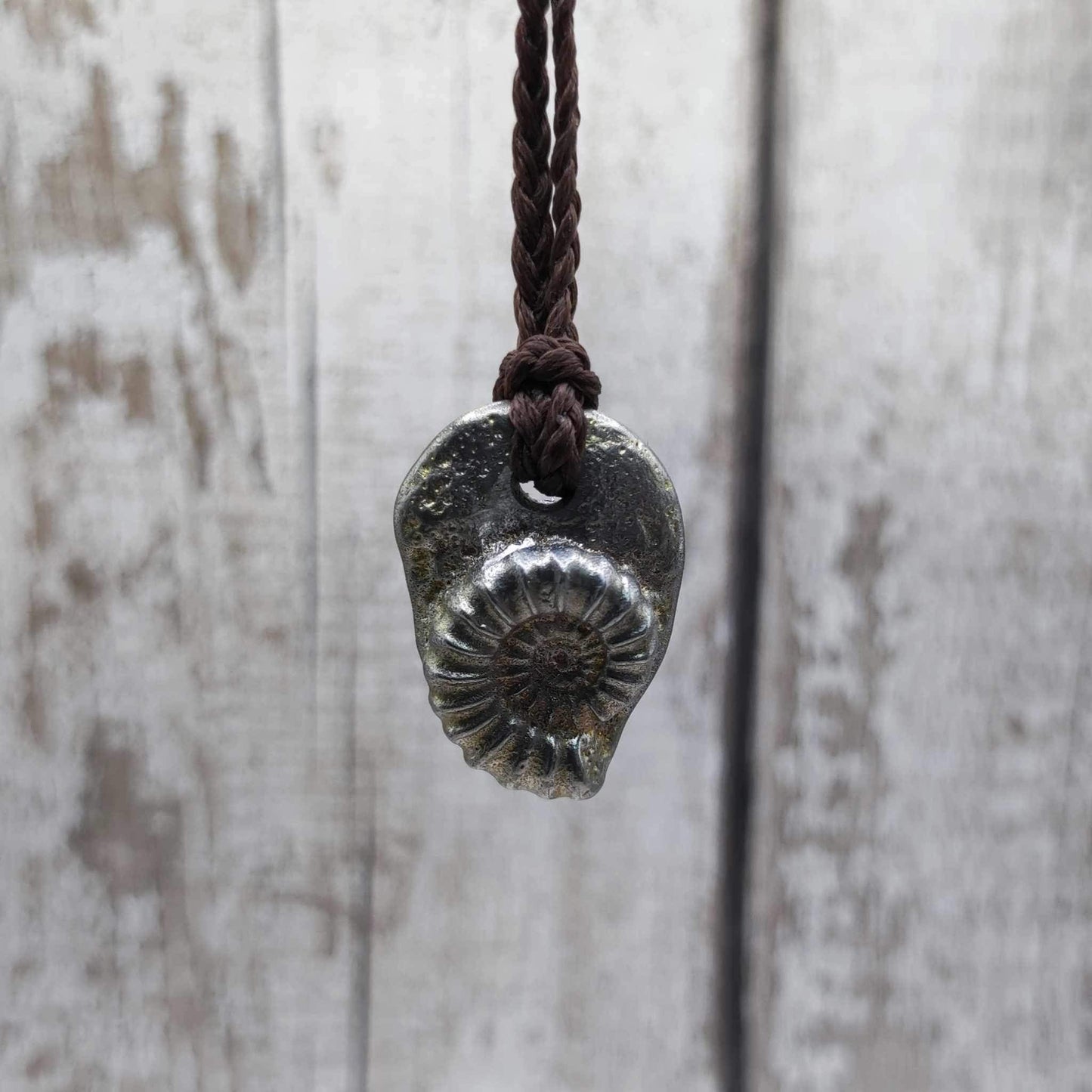 Pewter ammonite solid cast pendant.