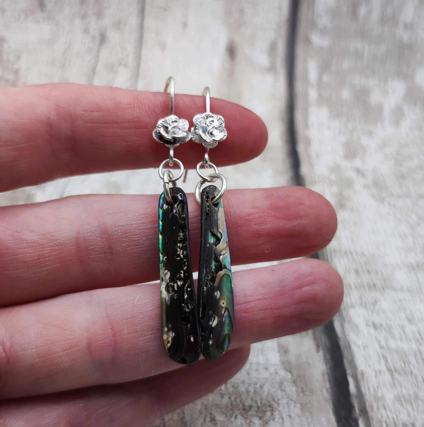 New Zealand rainbow Pāua abalone roimata earrings.