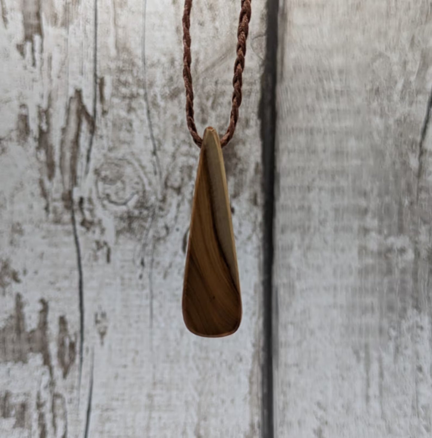 Yew wood roimata drop pendant.