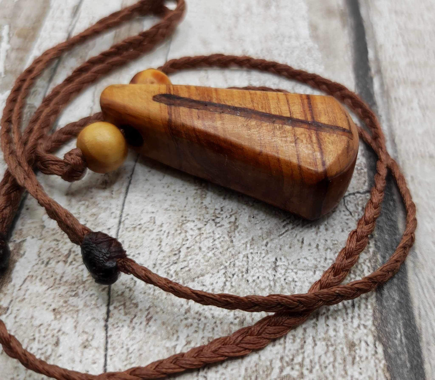 New Zealand Rimu wood and kauri copal gum pendant