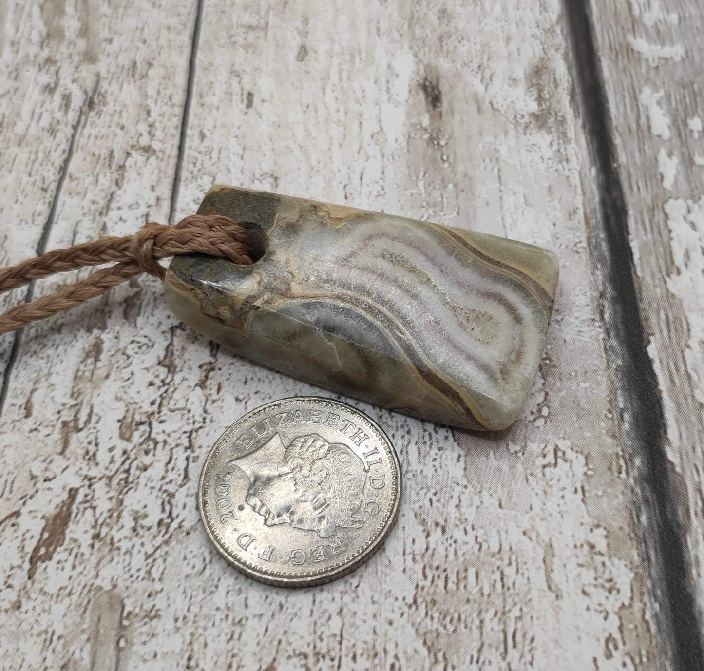 Ammonite chamber, calcite filled Toki style pendant.