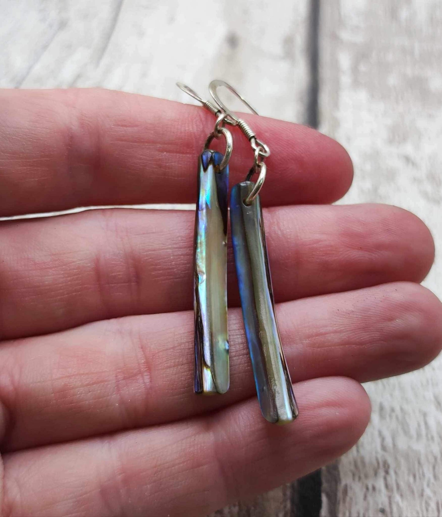 New Zealand rainbow Pāua shell Toki styled dangle earrings.