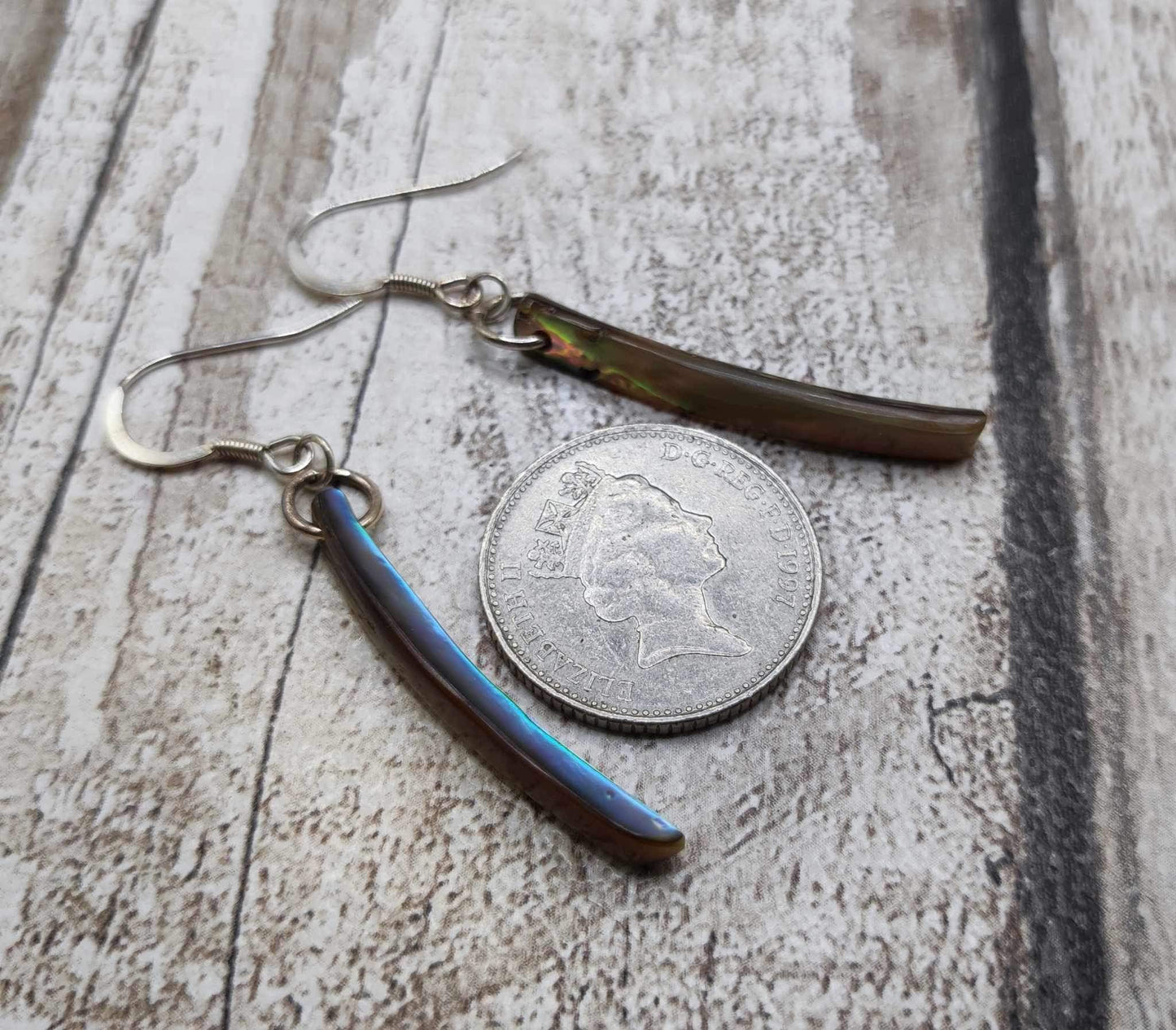 New Zealand rainbow Pāua shell Toki styled dangle earrings.