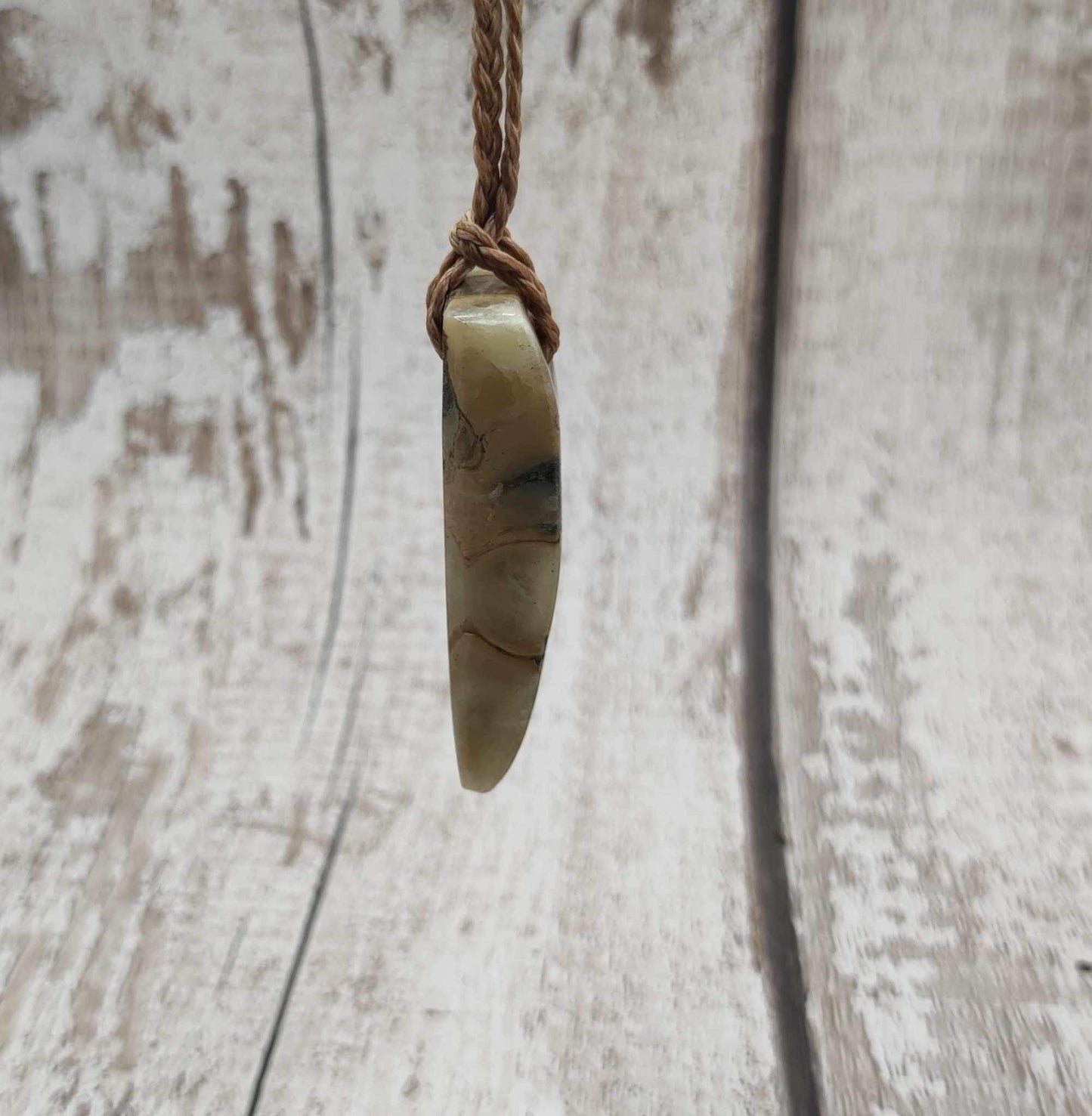 Ammonite chamber, calcite filled Toki style pendant.