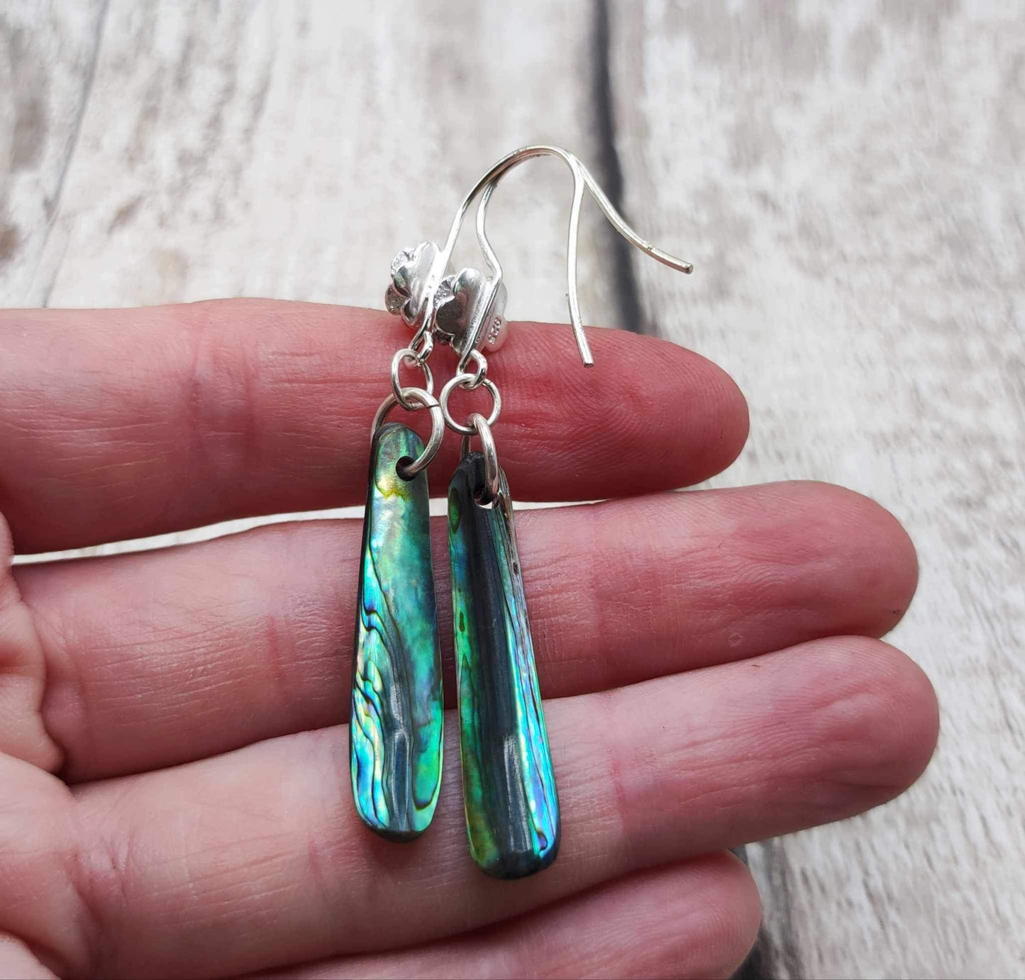 New Zealand rainbow Pāua abalone roimata earrings.