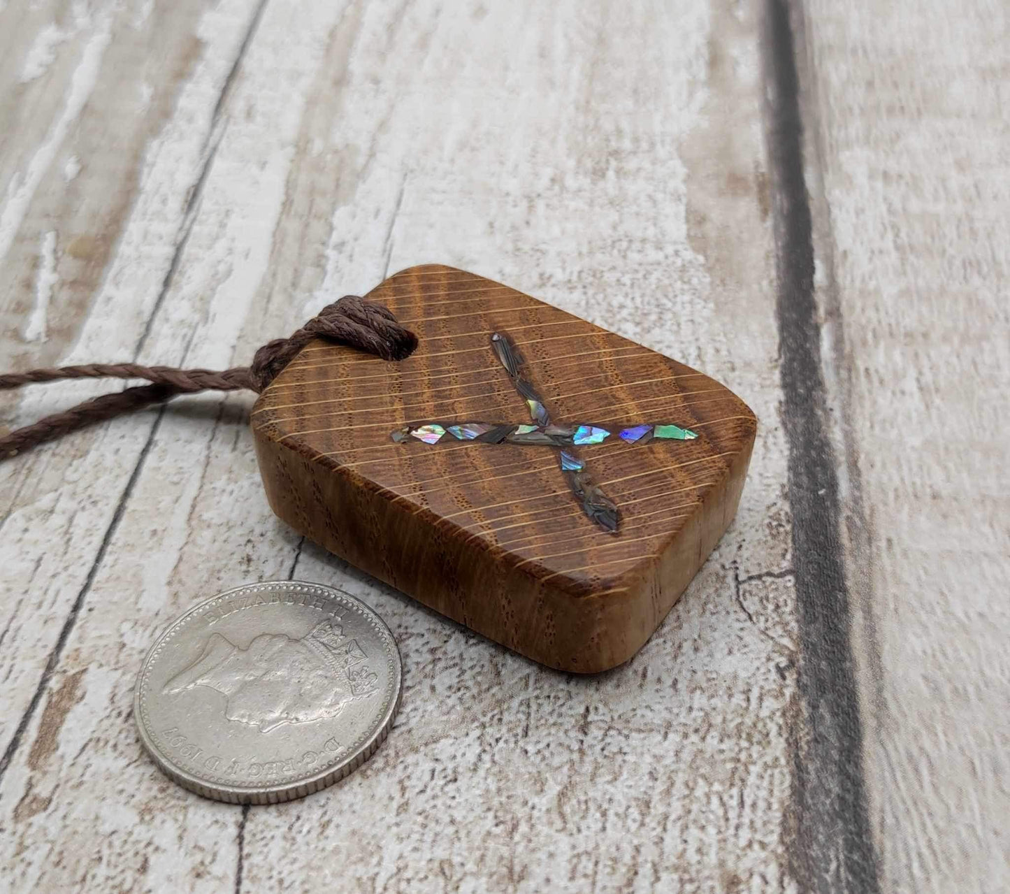 Oak wood gebo rune Christmas decoration with Pāua shell.