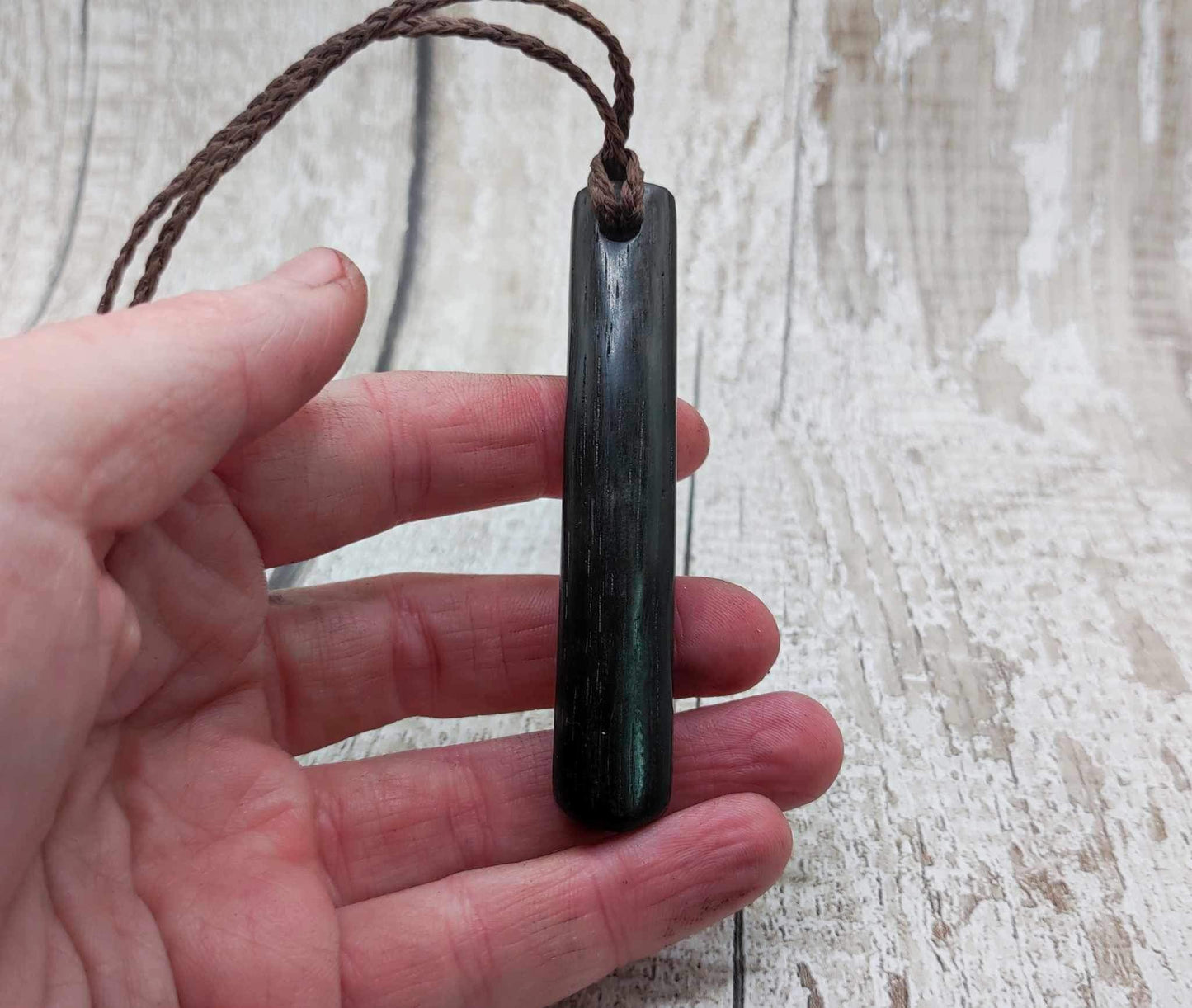 Bog oak + moldavite roimata carved pendant.