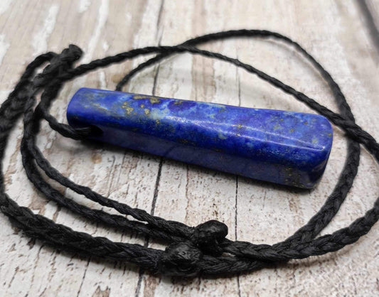 Lapis lazuli roimata drop stone pendant.