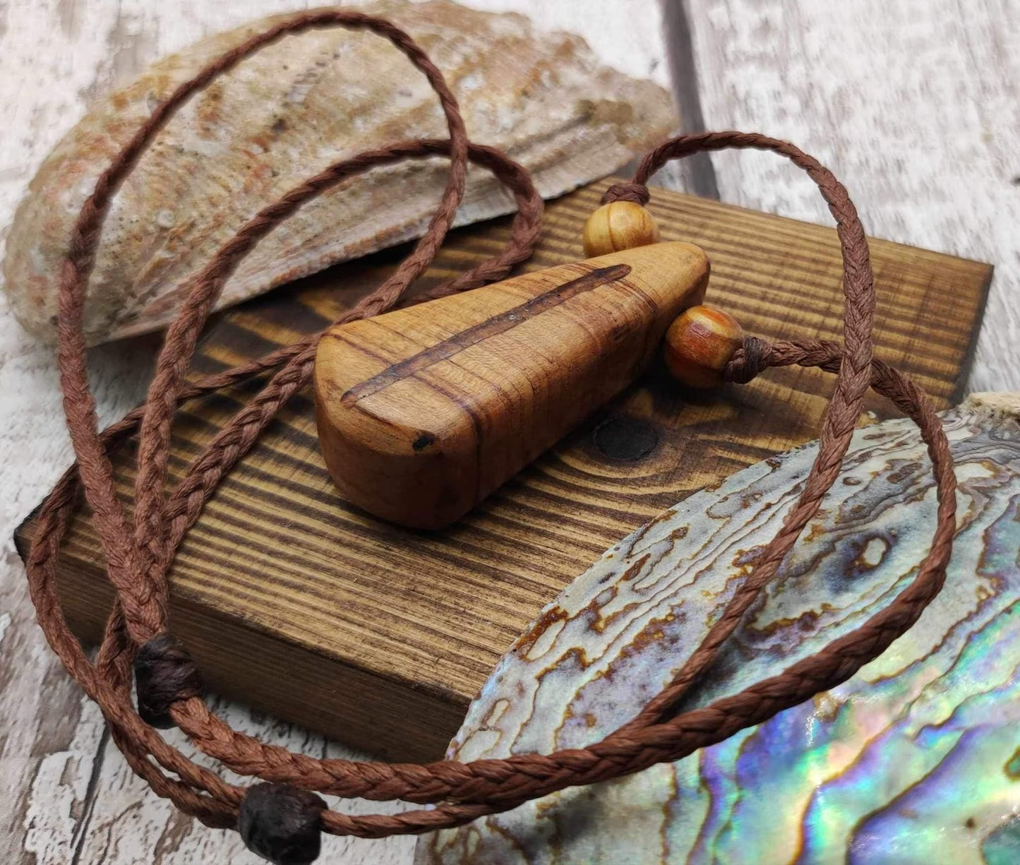 New Zealand Rimu wood and kauri copal gum pendant