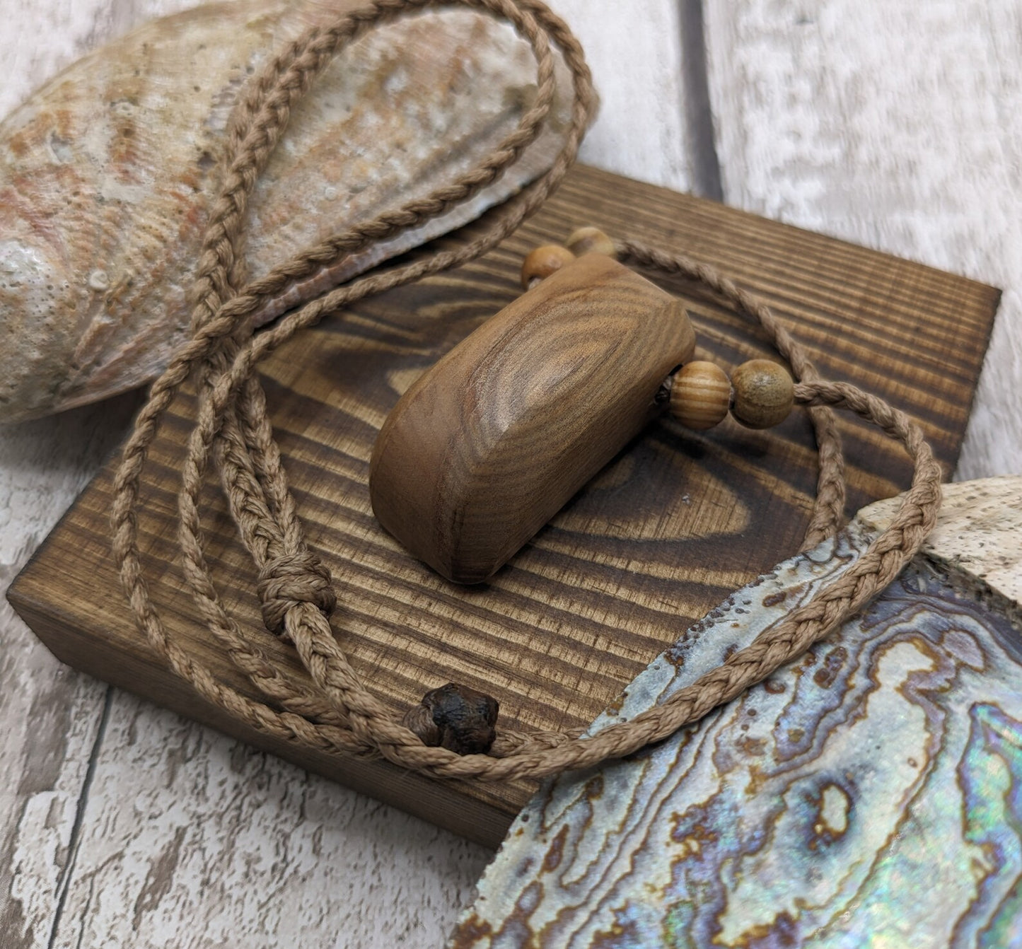 New Zealand Rimu wood unisex pendant.